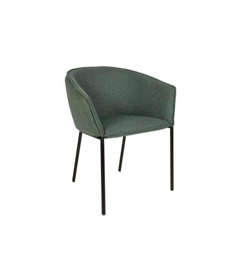 Fabric You chaise chair by Luca Nichetto 
Materials: Structure in black lacquered metal, seat covered with fabric or leather
Technique: Lacquered Metal. 
Dimensions: 63 x 57 x H 74 cm
Also available are upholstered different fabrics and also