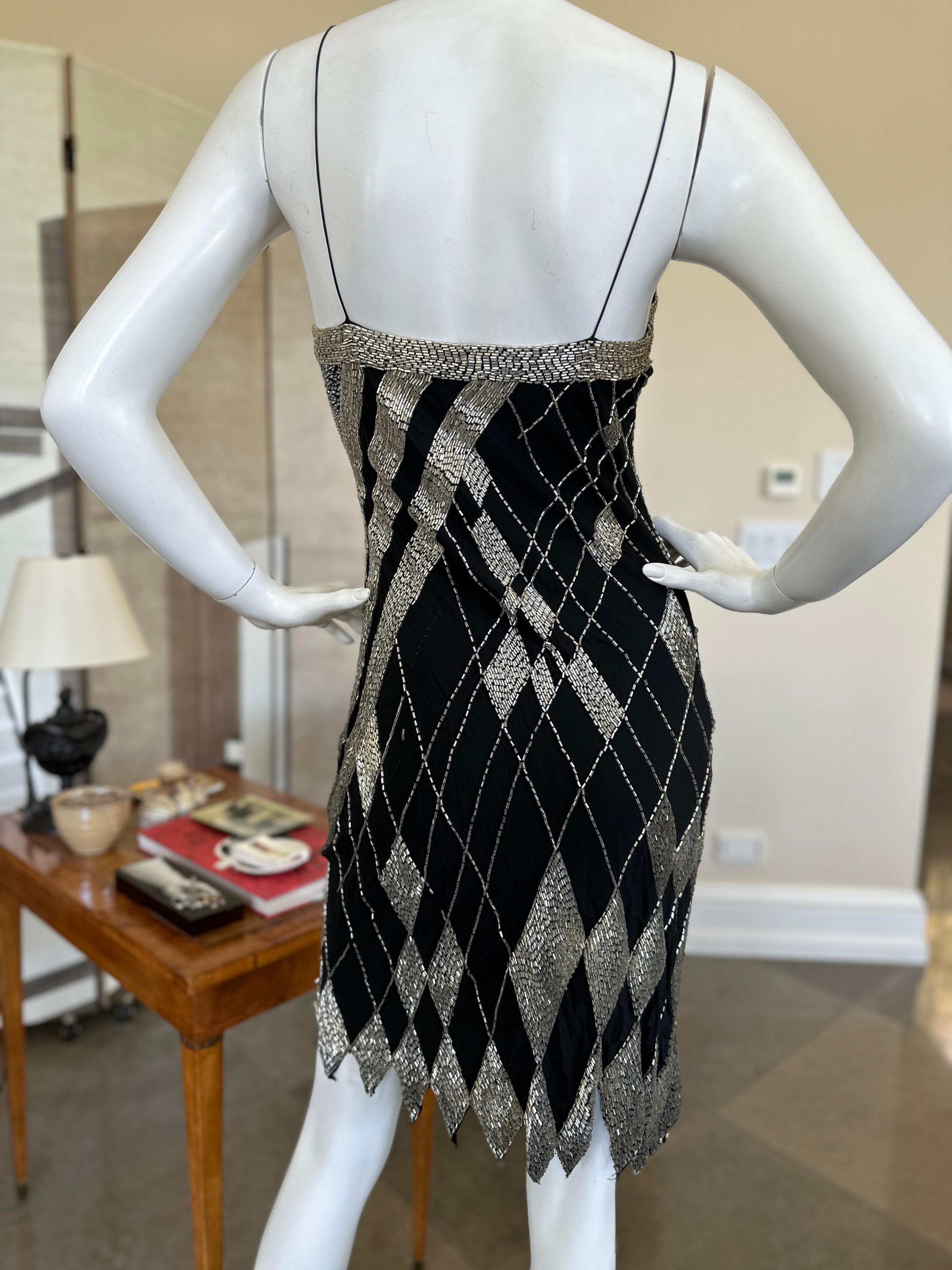Fabrice Black Silk Beaded Vintage Cocktail Dress with Silver Harlequin Beading
 Size S, there is no zipper or buttons.
 Bust 36
