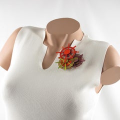 Fabrice Orange, Green and Purple Multi-Wheel Resin Brooch