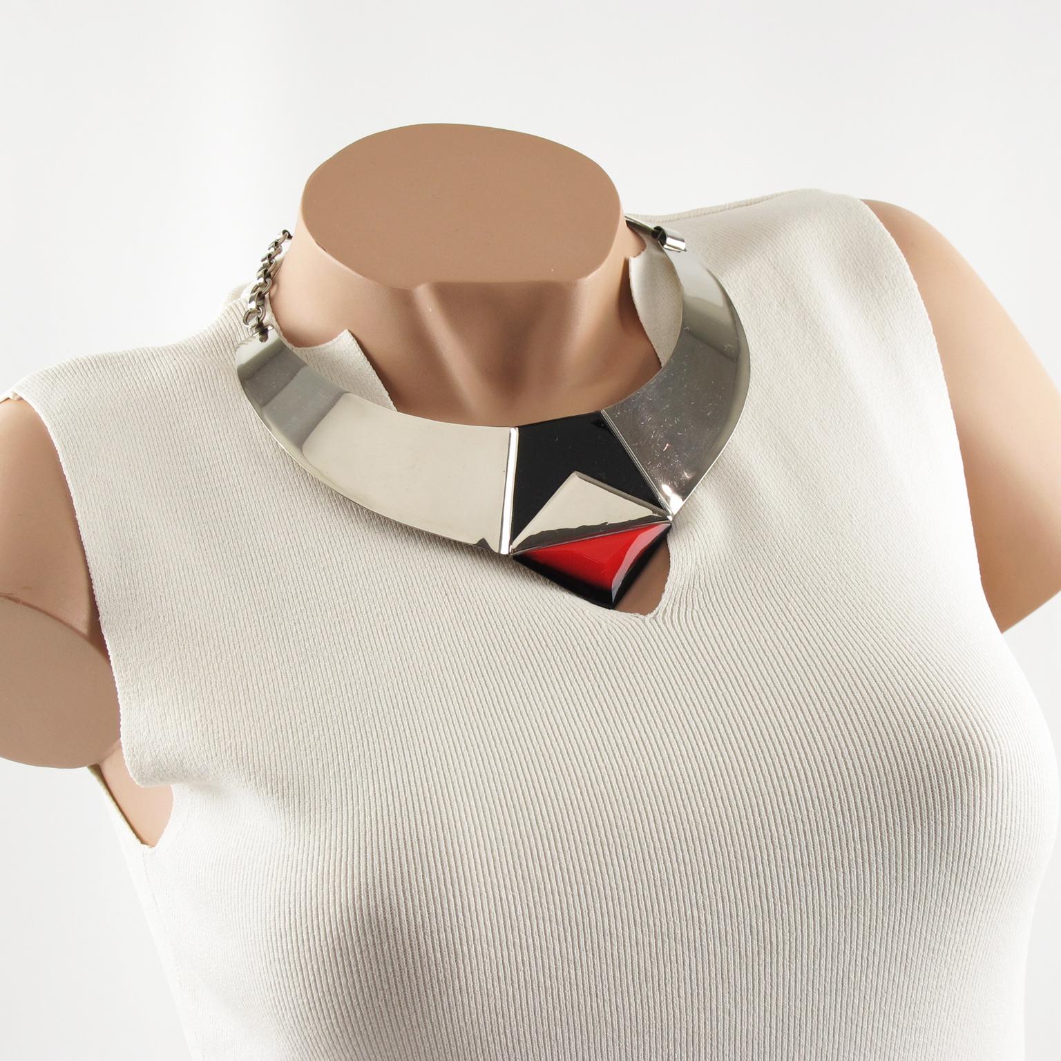 Rare Fabrice Paris Art Deco revival choker necklace. Art-Deco inspired piece featuring an oversized dimensional around the neck shape with chromed metal in shiny finish aspect, topped with black enamel and geometric red and black resin cabochon.