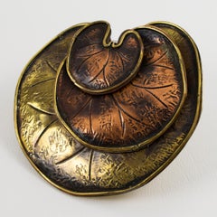 Spilla floreale in metallo bicolore Fabrice Paris