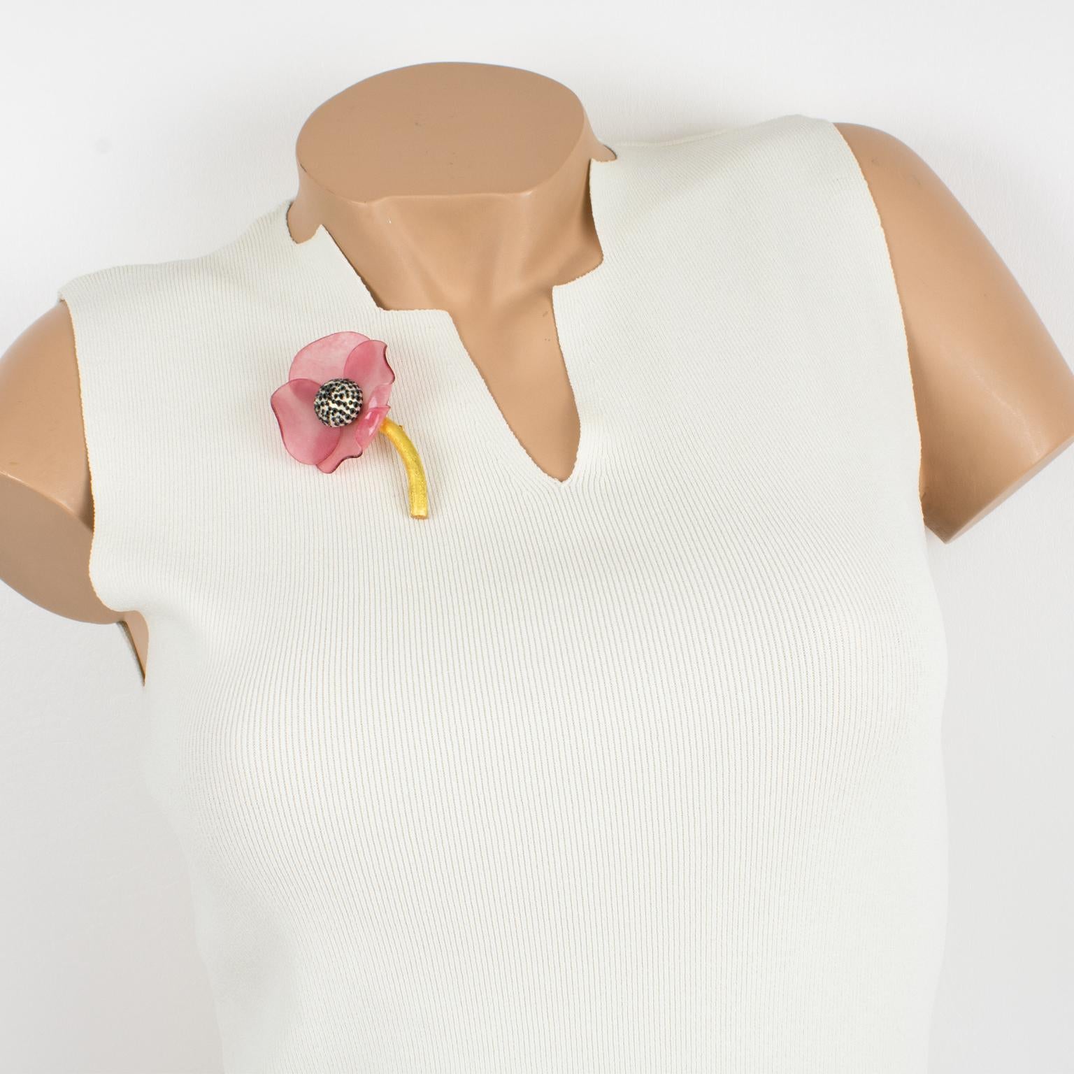 Charming dimensional pin brooch designed by Cilea Paris for French jewelry store Fabrice. Floral-inspired hand-made artisanal resin brooch featuring poppy flowers with textured patterns built together to form a powerful statement piece. Very nice