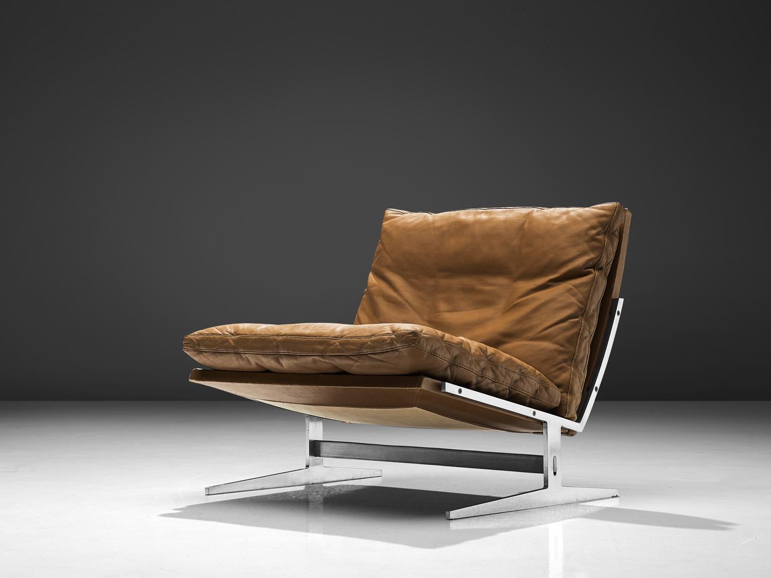 Preben Fabricius & Jørgen Kastholm, lounge chair model BO561, brushed steel and brown leather, Denmark, 1962. 

This modern slipper chair is executed in steel and leather. This chair holds an L-shaped seating. This shape is repeated in the legs. A