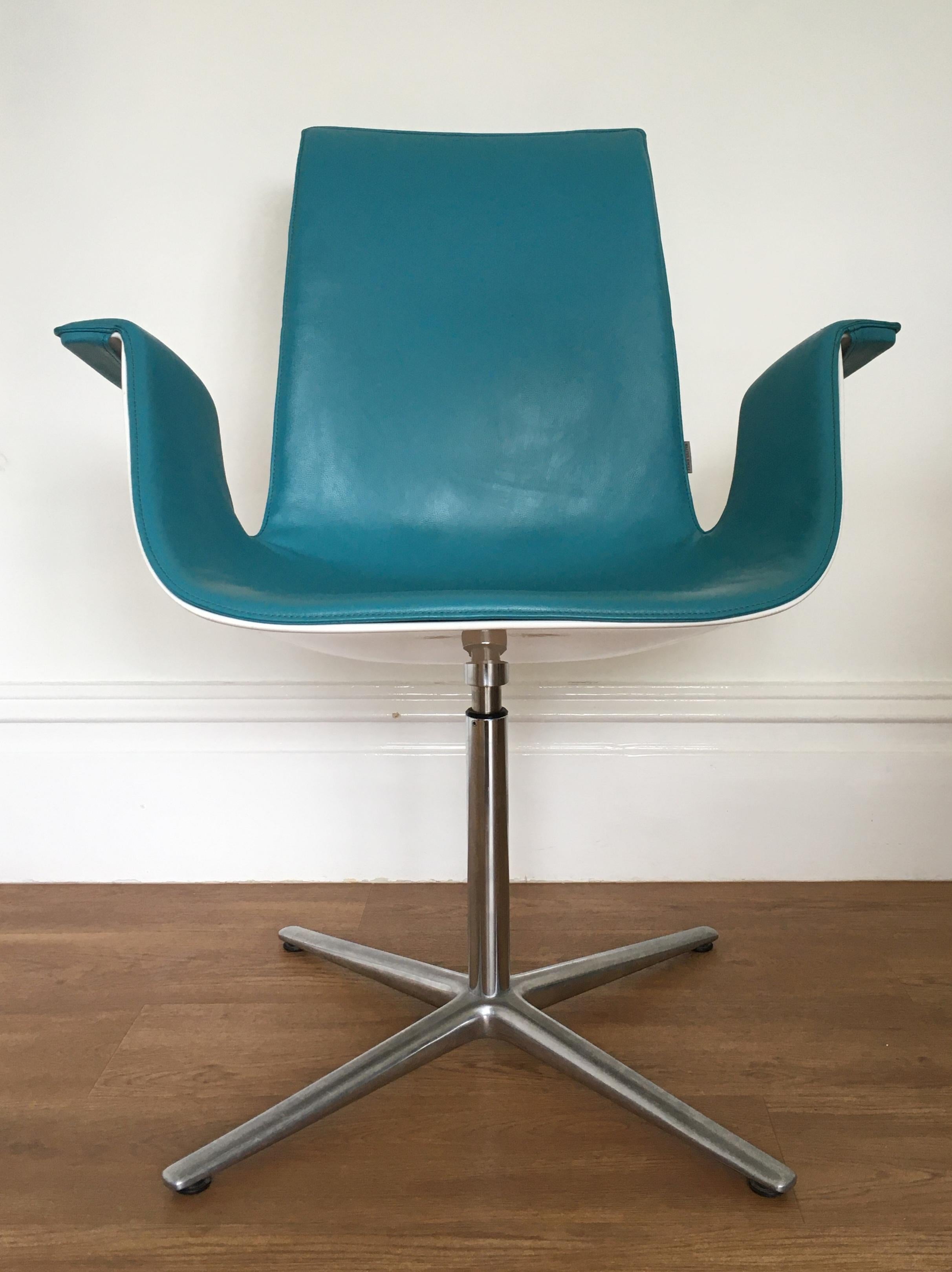 Originally designed in 1967 by Fabricius and Kastholm the FK bucket chair (also known as the bird chair) is one of the iconic, instantly recognisable, designs from the mid 20th century.

The chair features turquoise leaher upholstery with a white