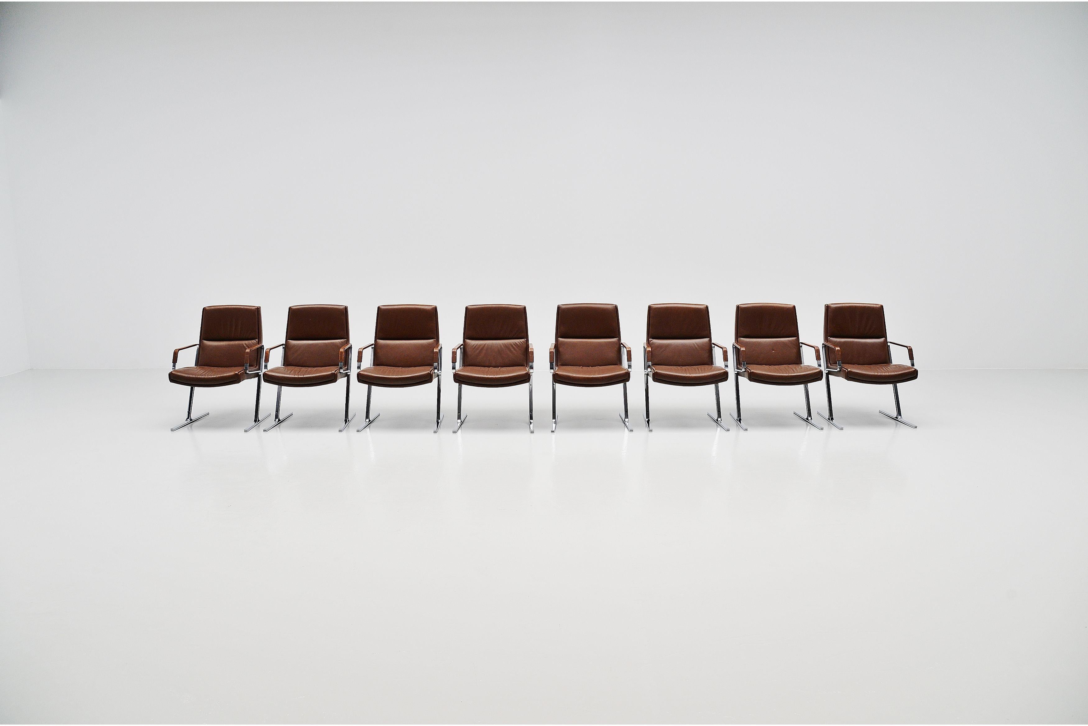 Large set of 8 office chairs model FK711 designed by Preben Fabricius and Jorgen Kastholm and manufactured by Walter Knoll, Germany 1971. These heavy office chairs have matt chrome plated, solid steel frames and chocolate brown leather upholstery.
