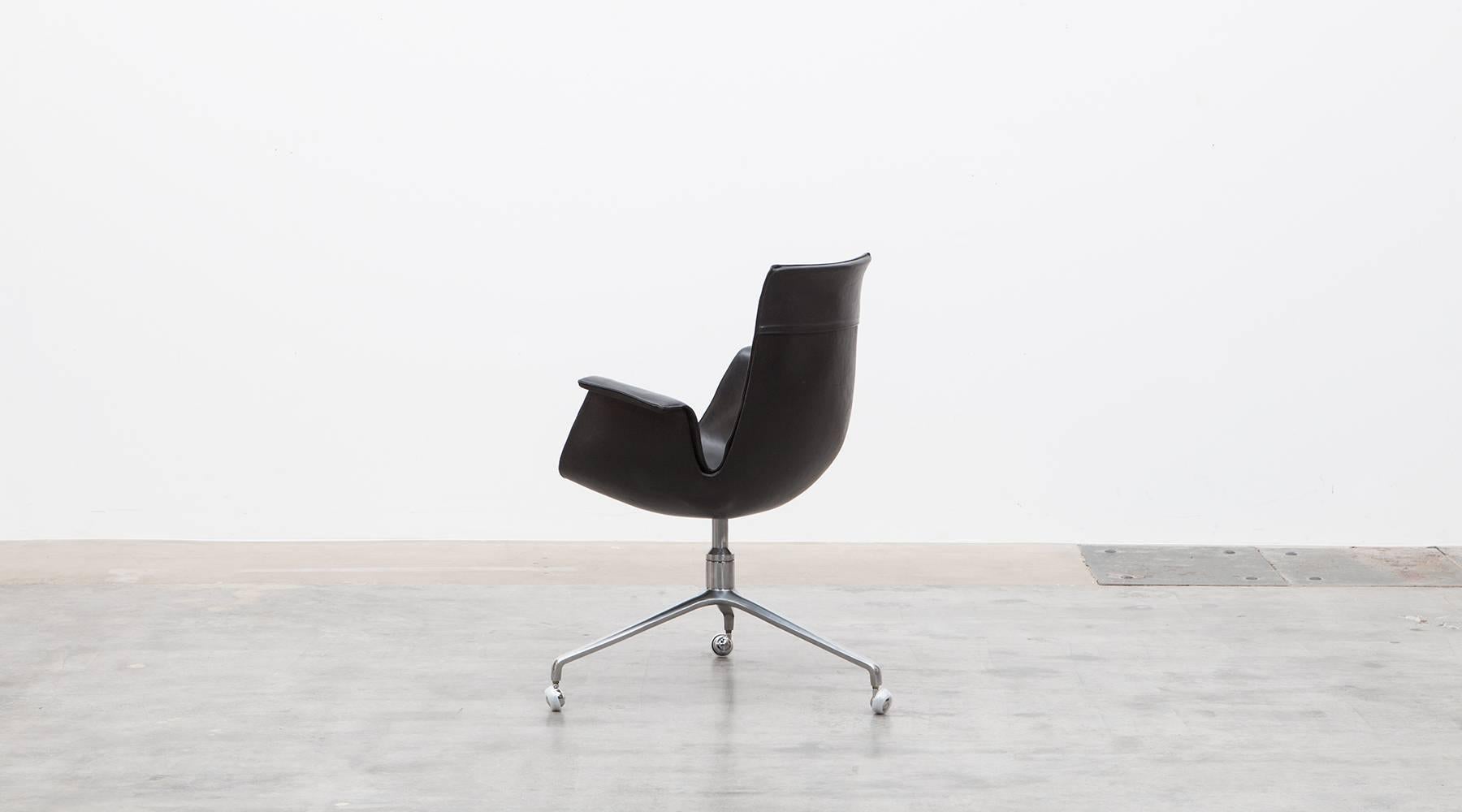 German Fabricius or Kastholm Leather Swivel Chair
