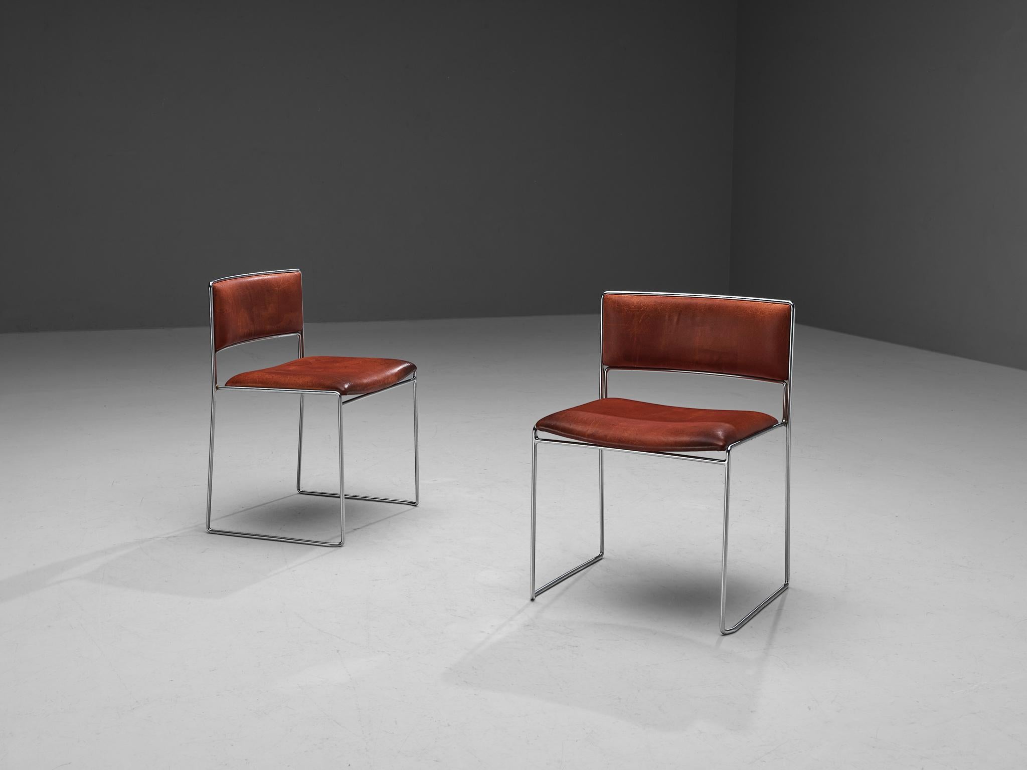 Preben Fabricius & Jørgen Kastholm for Kill international, pair of dining chairs, leather, chrome-plated metal, Germany, 1960s. 

Pair of stylish dining chairs designed by Preben Fabricius & Jørgen Kastholm in the 1960s. A striking combination of