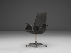 Fauteuil pivotant Fabricius & Kastholm en cuir et acier