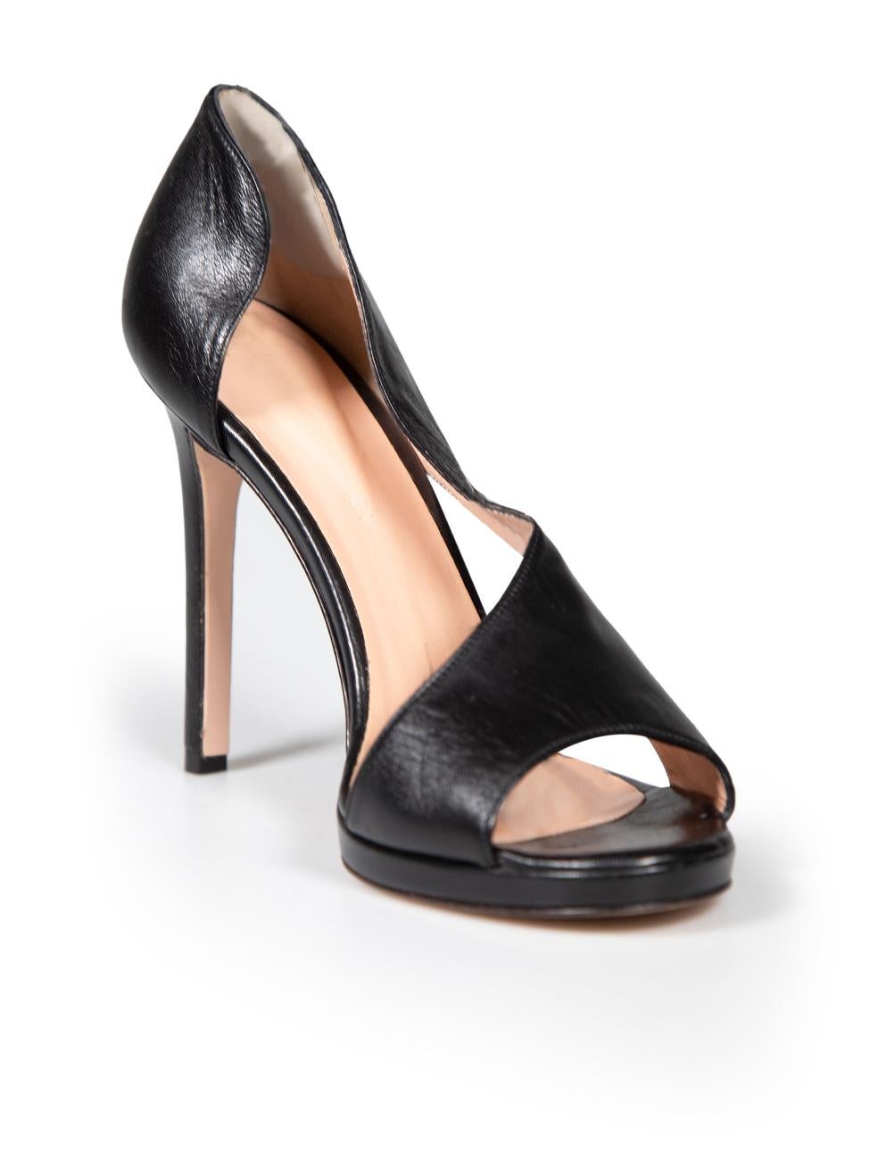 CONDITION is Very good. Minimal wear to heels is evident. Minimal wear to soles, with abrasions to the heel post on this used Fabrizio Bulckaen designer resale item.
 
 
 
 Details
 
 
 Black
 
 Leather
 
 Heels
 
 Open toe
 
 Side cut out detail
 
