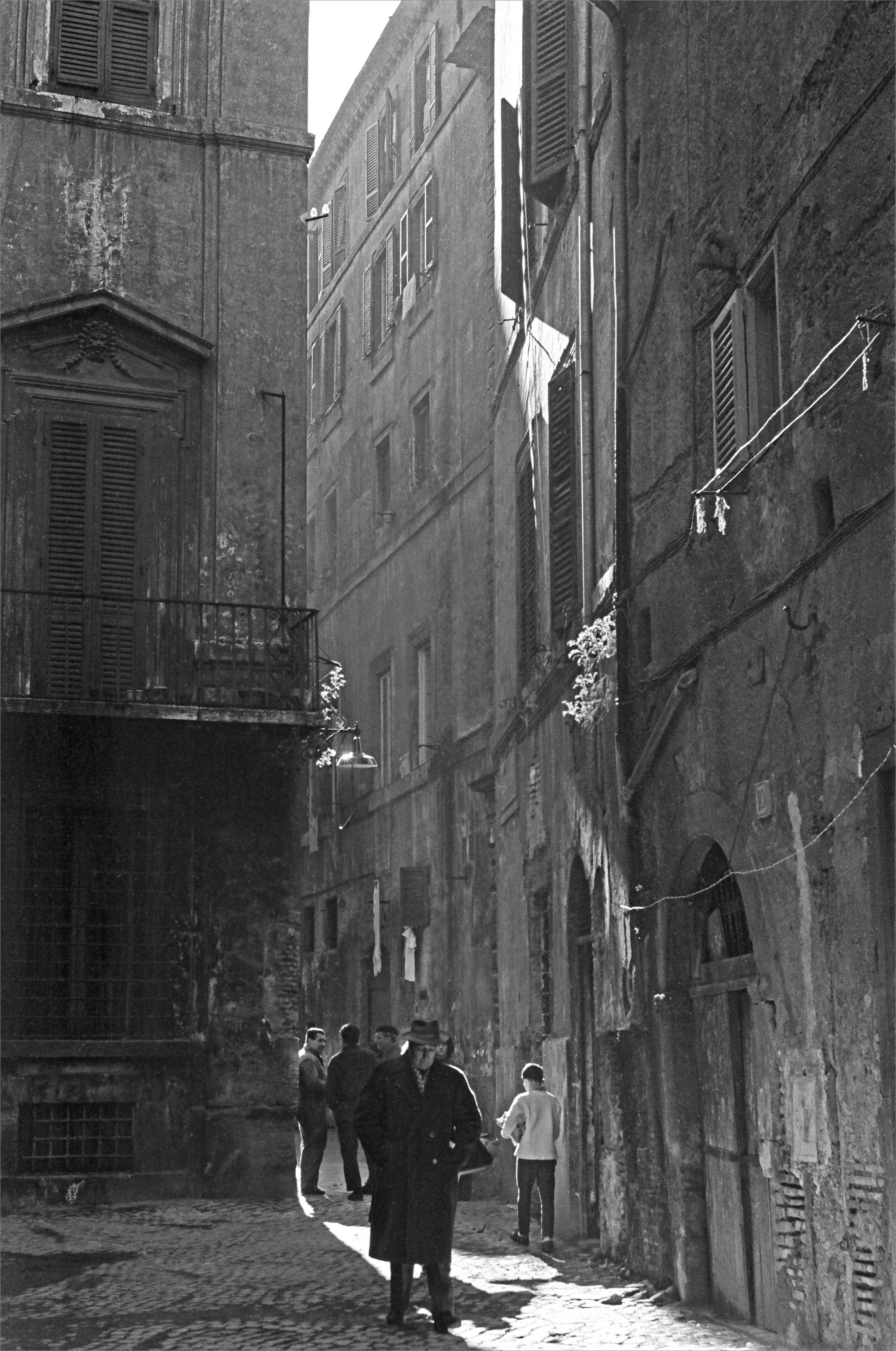 Fabrizio La Torre Black and White Photograph - Uomini dell’ombra, Roma - 1962 - Contemporary Black & White Photography