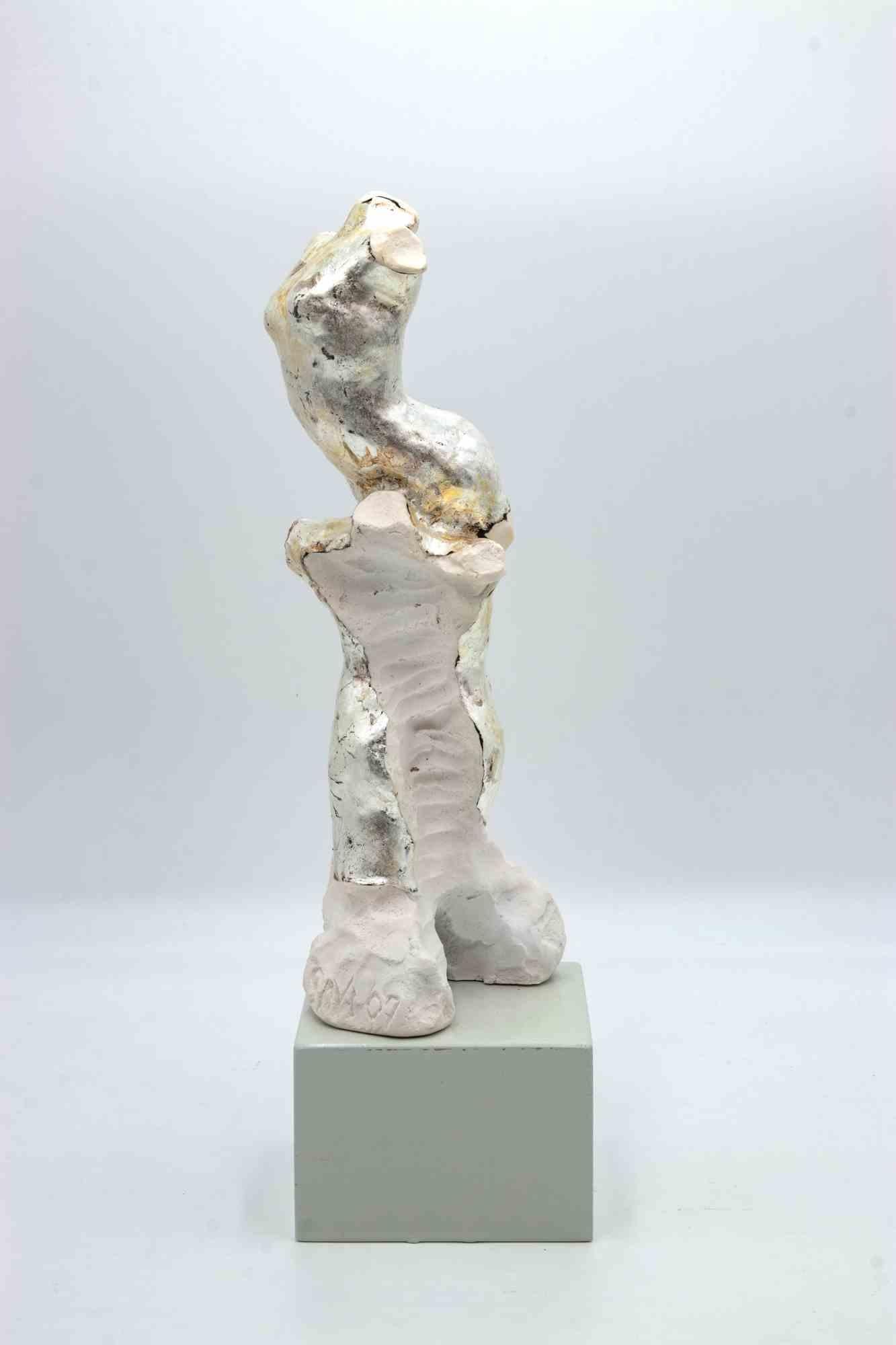 Body of woman is an original sculpture realized by Fabrizio Savi in the 2000s. 

Two  bodies emerge from the plaster material across each other in an upward thrust.

Lacquered plaster.

38X11 cm with wooden base included.

Signature engraved on the