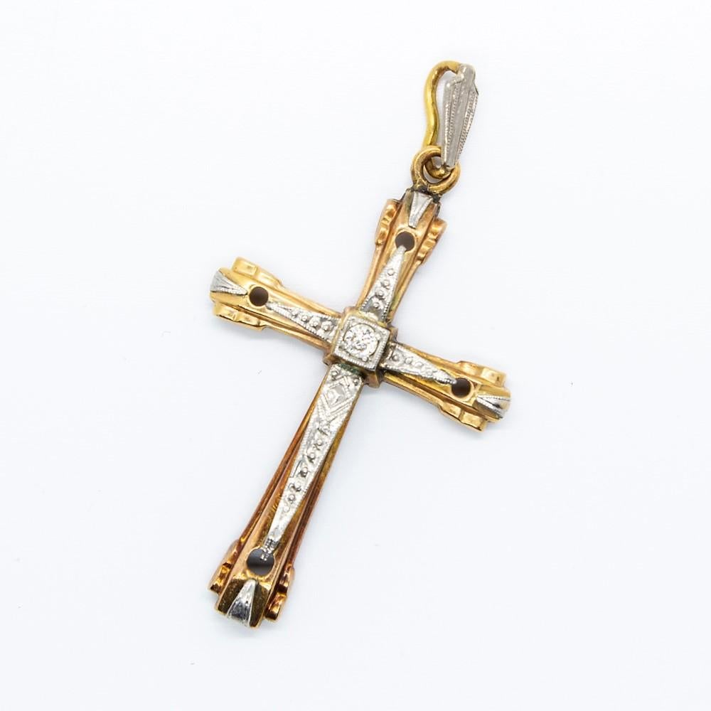 This is a unique cross handmade in 18k gold and platinum.
Original and amazing in design, this elegant piece of jewelry displays one European cut diamond that weighs 0.06ctw.
Cross measure: 48mm by 25mm by 5mm
Total weight: 4 grams - 2.5dwt
