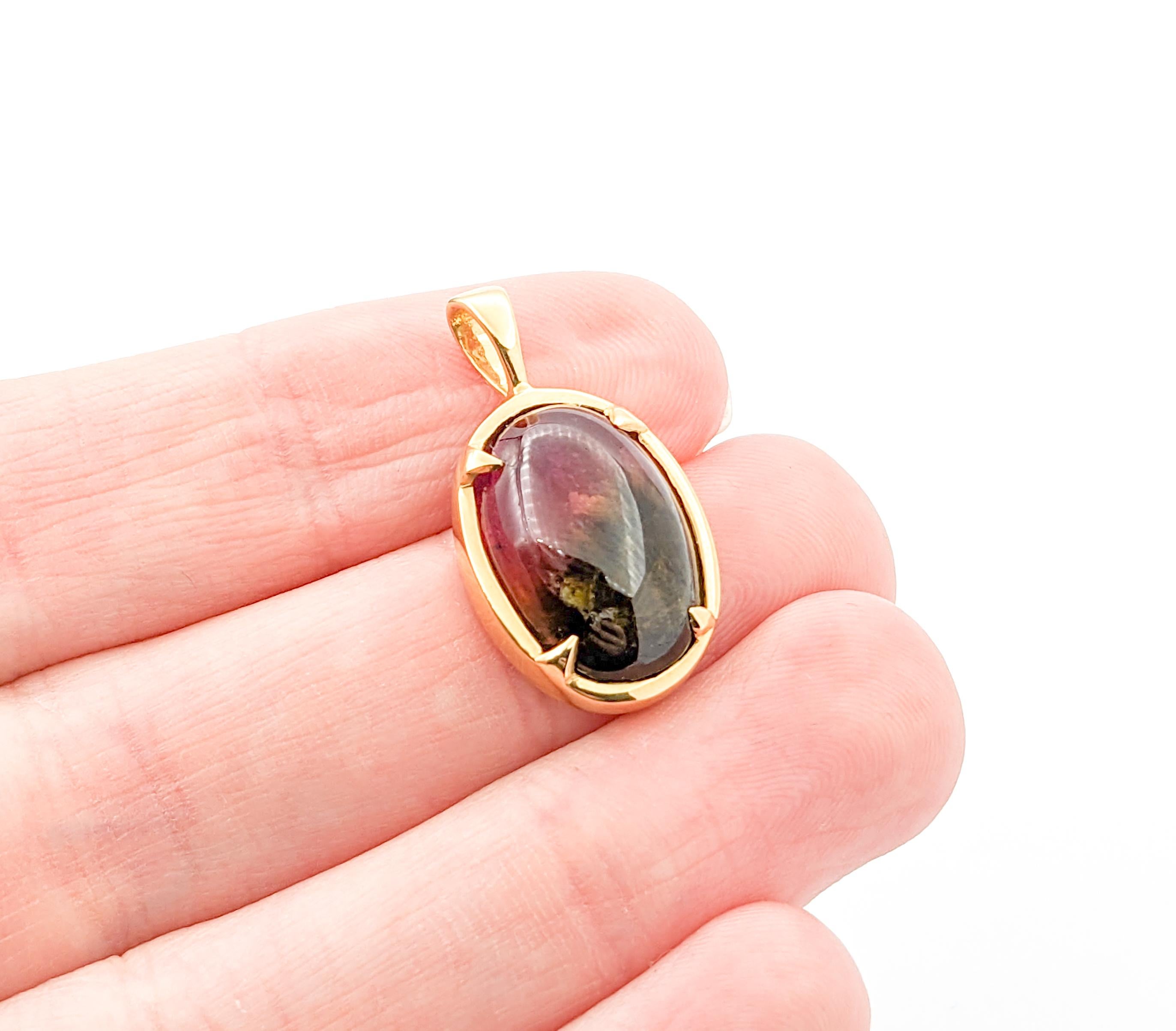 Fabulous 18k Oval Cabochon Watermelon Tourmaline Charm Pendant

Introducing our exquisite 18k yellow gold pendant, a true testament to elegance and craftsmanship. Meticulously crafted, this pendant showcases a stunning 10ct oval cabochon watermelon