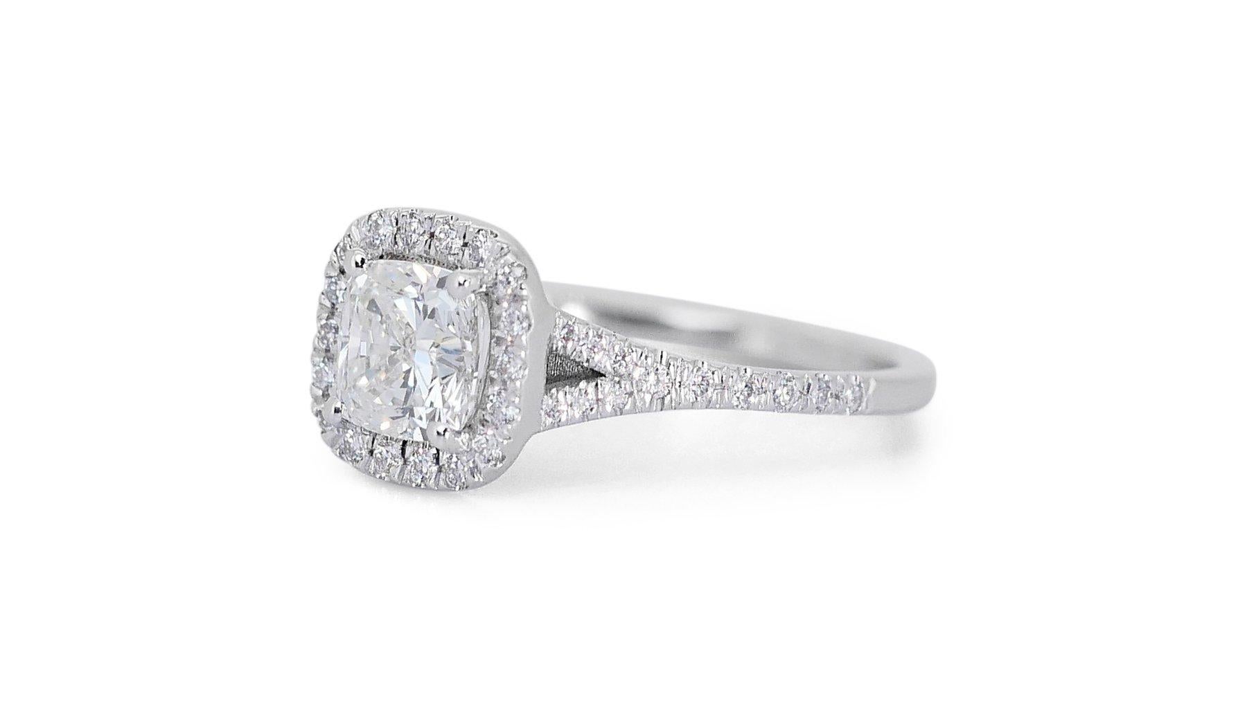 Adorn yourself with timeless beauty and sophistication with this Ideal 1.24ct halo natural diamond ring, a testament to luxury and refinement. Crafted with finesse and elegance, this stunning piece comes with a GIA Certification for its authenticity