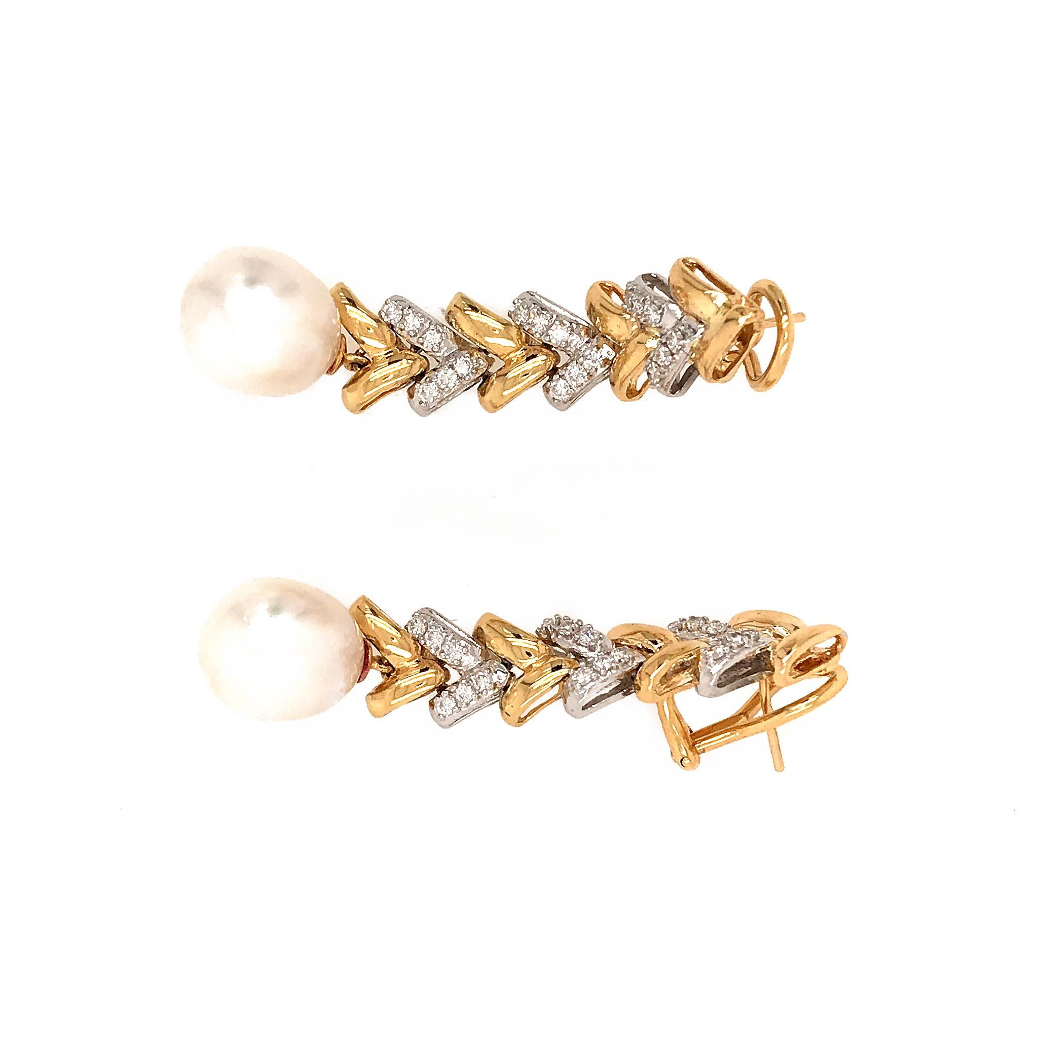 18k Yellow Gold
Total Weight: 16.4 grams
Pearl = 11 mm
Diamond = 0.72 ct twd (estimated)
Length: 2 inches
