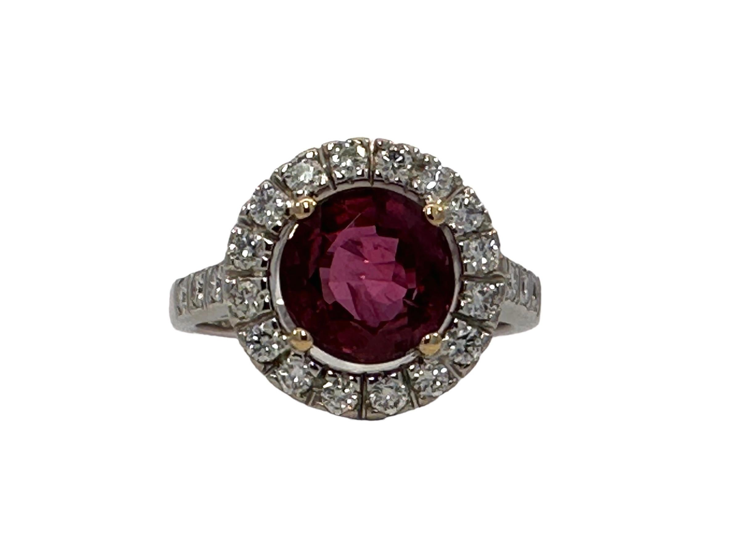 Fabulous 18kt White Gold 2.51 Ruby With Certificate and 0.44ct Diamonds

Ruby: Natural Corundum Ruby, Round cut, Intense Purplish Pinkish red, 2.51ct

Diamonds: 22 diamonds together 0.44ct

Material: 18kt white gold

Ring size: 51 EU / 5.75 US ( can