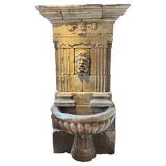 Fabulous 18th-19th century French carved stone fountain with Poseidon bust