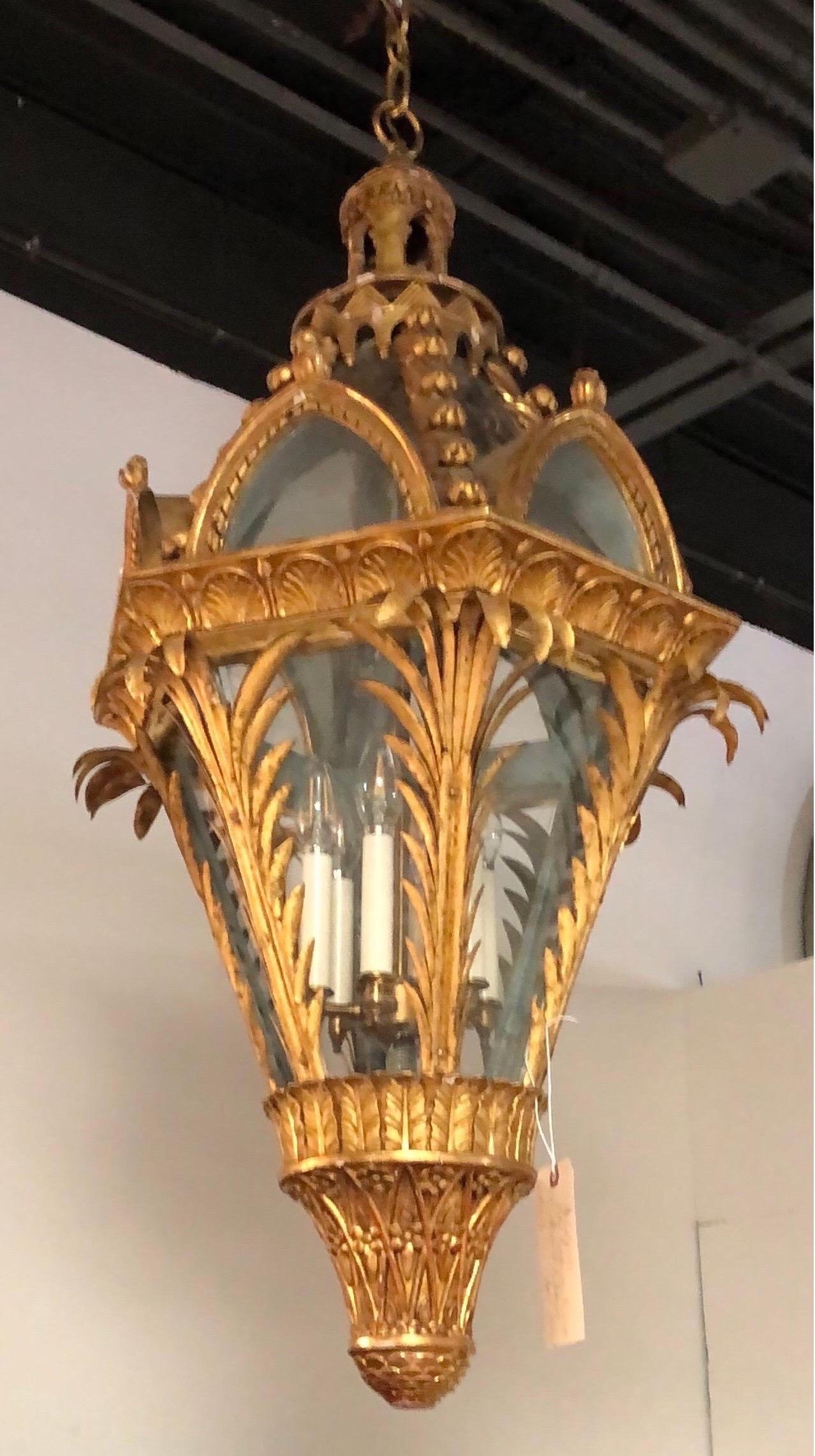 19th century giltwood and ole neo Gothic lantern. Italian or French, 19th century. Now electrified with 6 candle drop. Very impressive fixture.