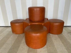 Fabulous 5 piece leather ottoman set attributed to Pierre Cardin