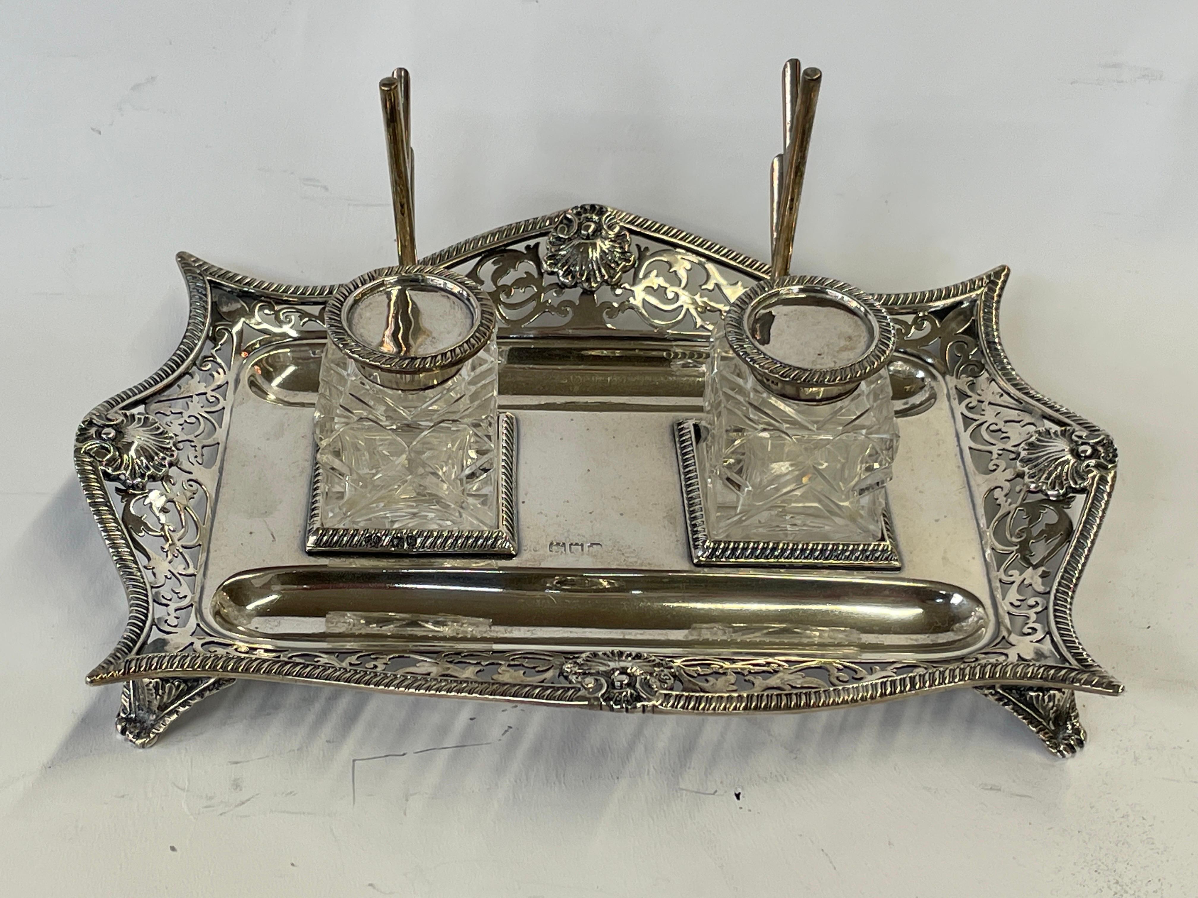 Exquisite Antique English hallmarked STERLING SILVER and cut crystal Two Bottle Inkstand or Standish, hallmarked London, 1904/'05 with maker's marks for the Royal Warranted silversmith, William Hutton & Sons. This Georgian style inkstand is