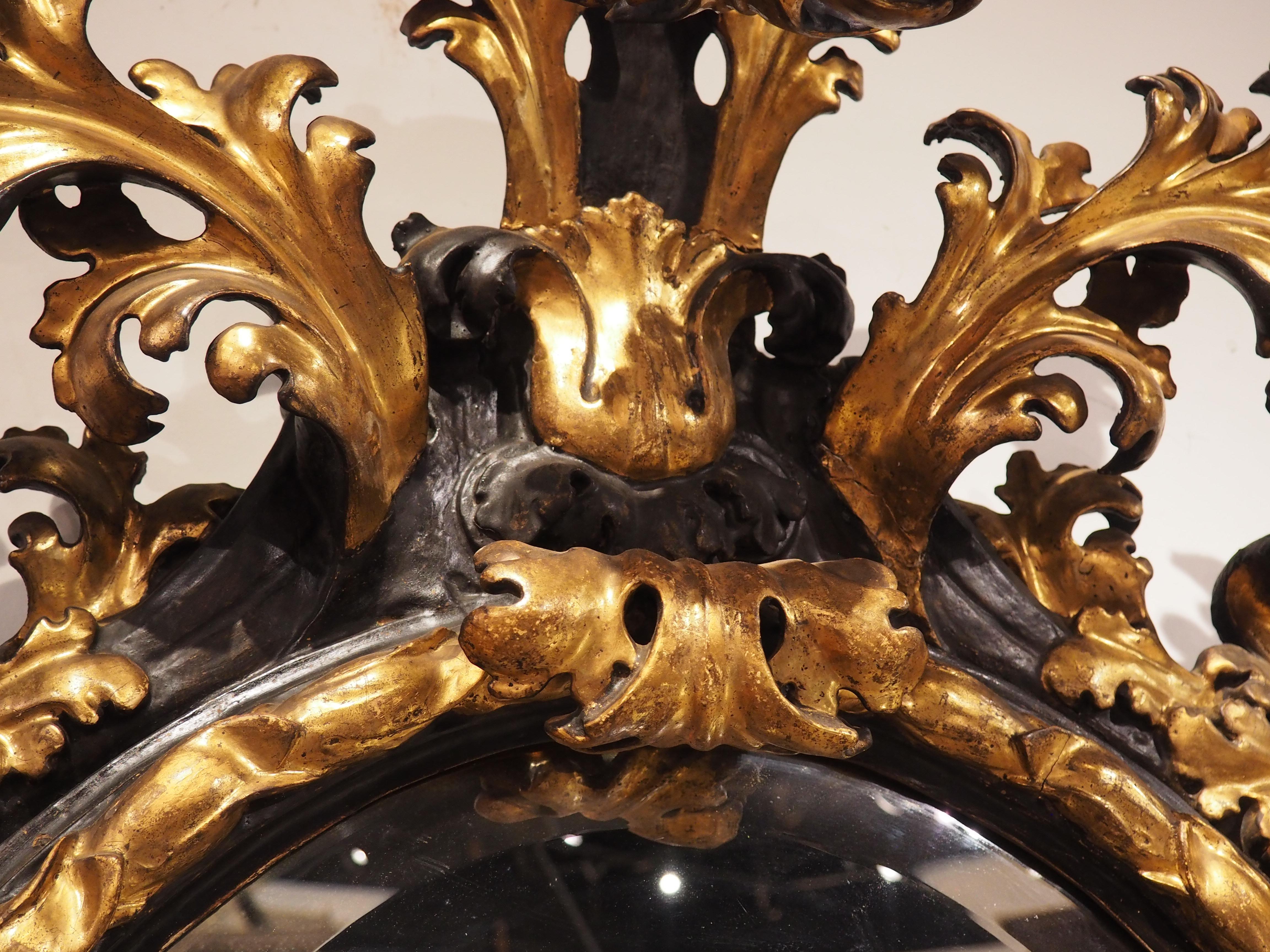 Mid-19th Century Fabulous Antique Florentine Black and Gold Wall Mirror, Circa 1850 For Sale