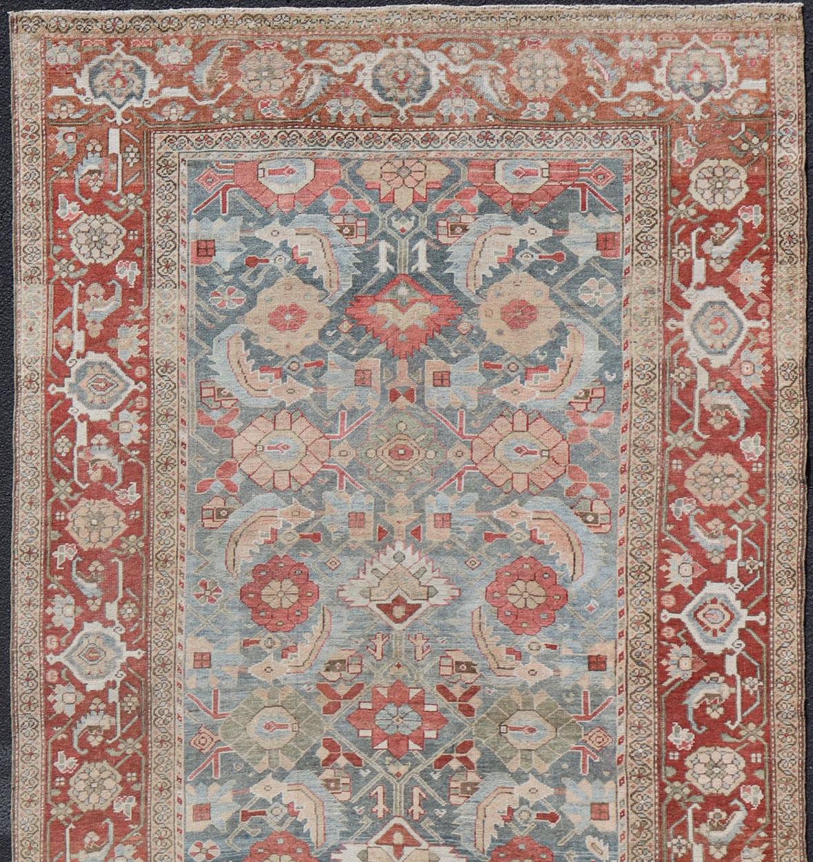 Amazingly beautiful Persian Sultanabad antique gallery rug with all over Herati design in light blue background, red border, with numerous delicate colors such as light green, yellow, cream, taupe with all-over design, rug EN-2326, country of origin