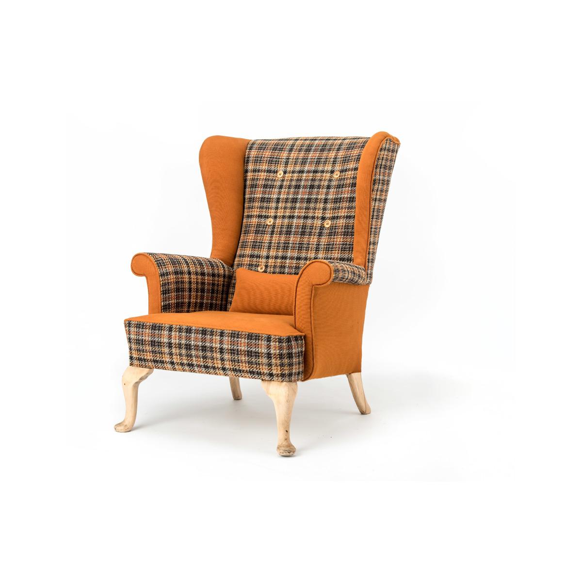 Original Parker Knoll unique fireside wing chair reupholstered in a funky ‘Autumn Nut’ tweed with contrasting Toffee panels with 6 burnt wooden deep buttoned back detail and resting on original sanded legs. Complete with contrasting scatter cushion