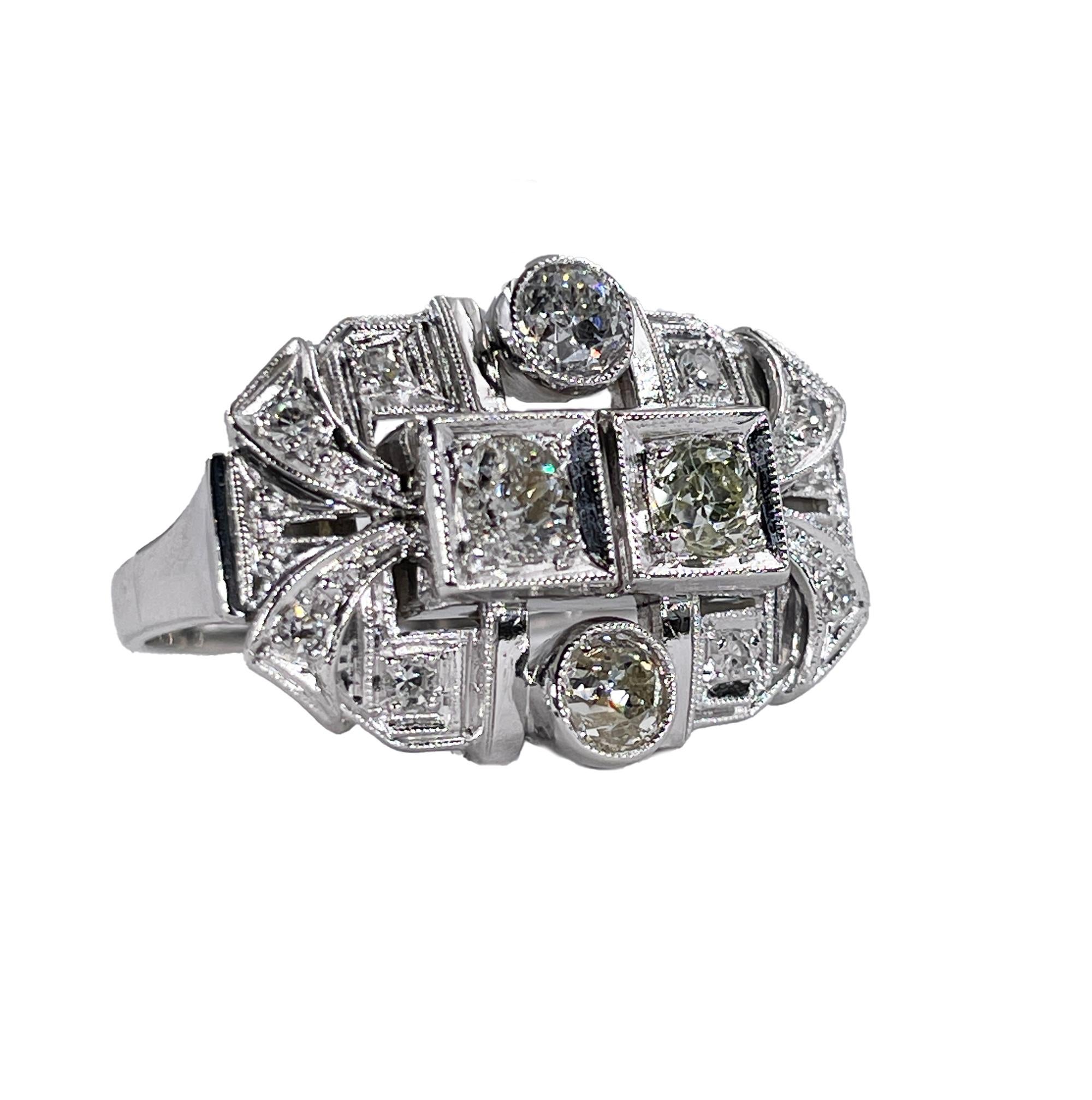 Inspired by Hollywood, created in times when Art Deco geometric meet Retro glamour. Bold and elaborate. This distinctively striking Jazz Age jewel is hand fabricated in 14k White Gold (tested), circa 1930s, impressively hugs your finger with a