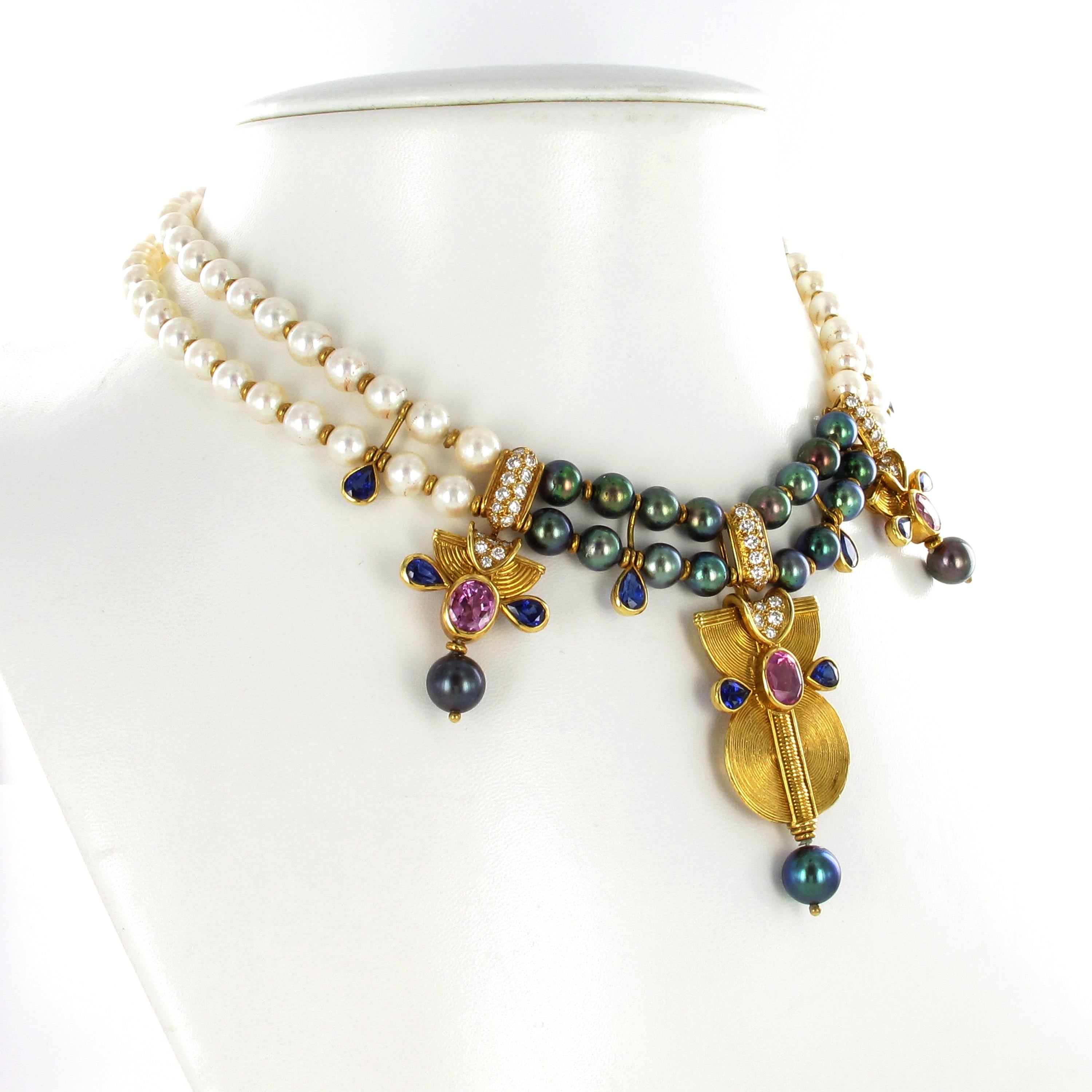 This extraordinary necklace by french jeweller Boucheron shows a stunning combination of colours and precious stones. 19 dark green and highly lustrous Tahitian cultured pearls are combined with 78 white and perfectly round Akoya cultured pearls