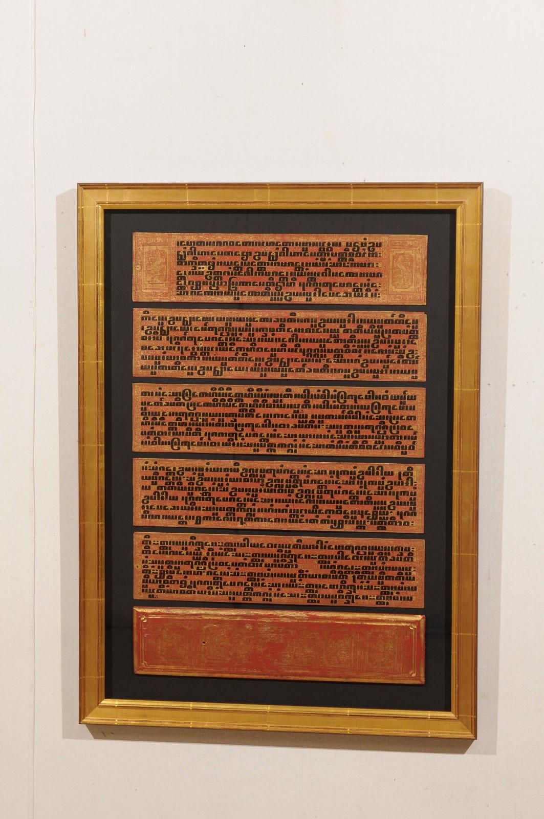 A fabulous collection of 19th century Buddhist manuscripts artistically displayed within custom frames. This collection of three framed wall art hangings each contain a section of a 19th century manuscripts written in Kammavaca, a sacred religious