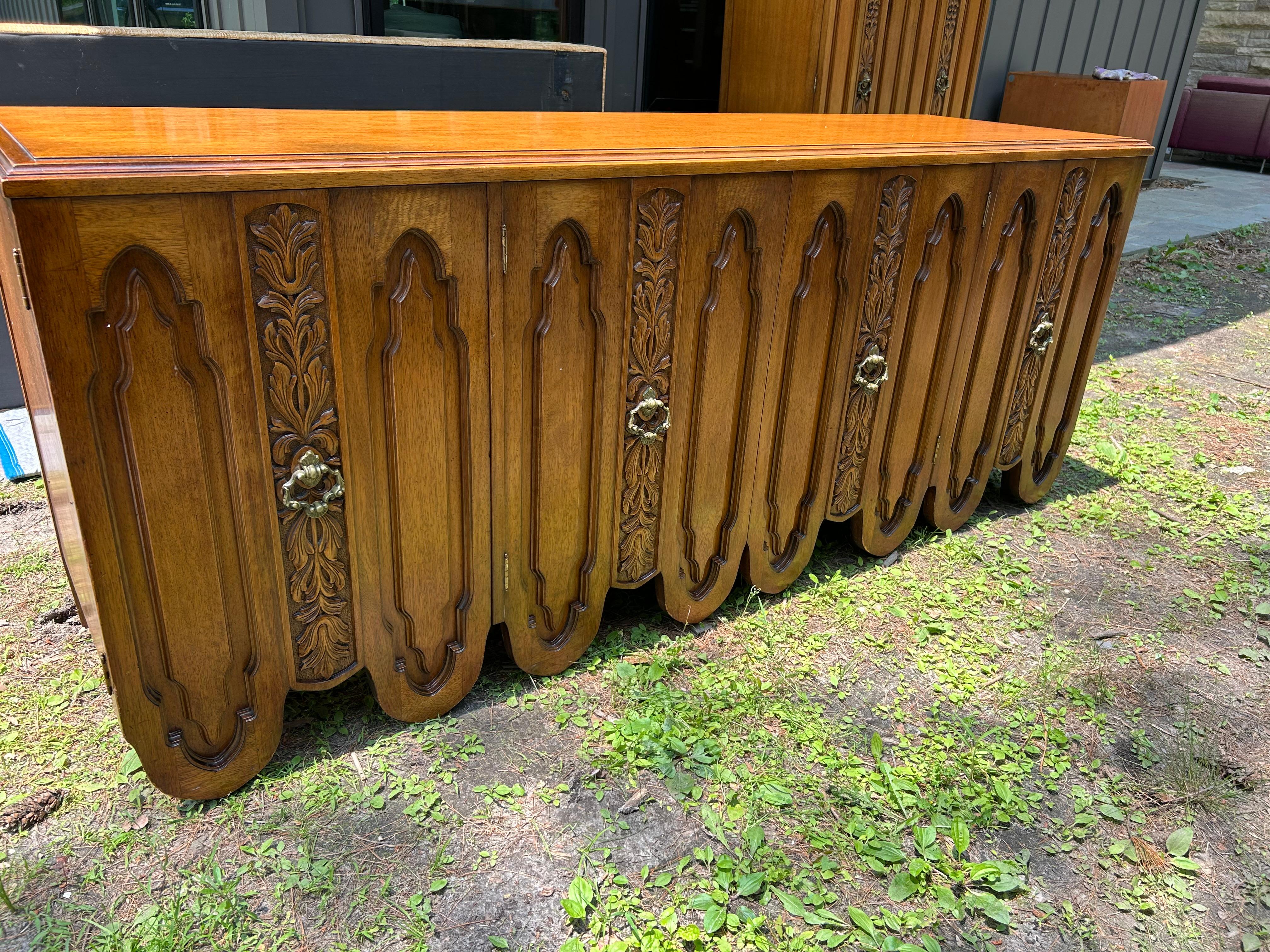 Fabulous Daniel Jones Inc. Spanish Revival 9 Drawer walnut dresser credenza.  This is one of those rare pieces that stops you in your tracks-so unique!  I just love the quality and craftsmanship of this piece-they surely don't make furniture like