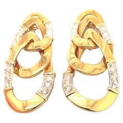 Fabuleuses boucles d'oreilles pendantes David Webb en or et platine avec diamants