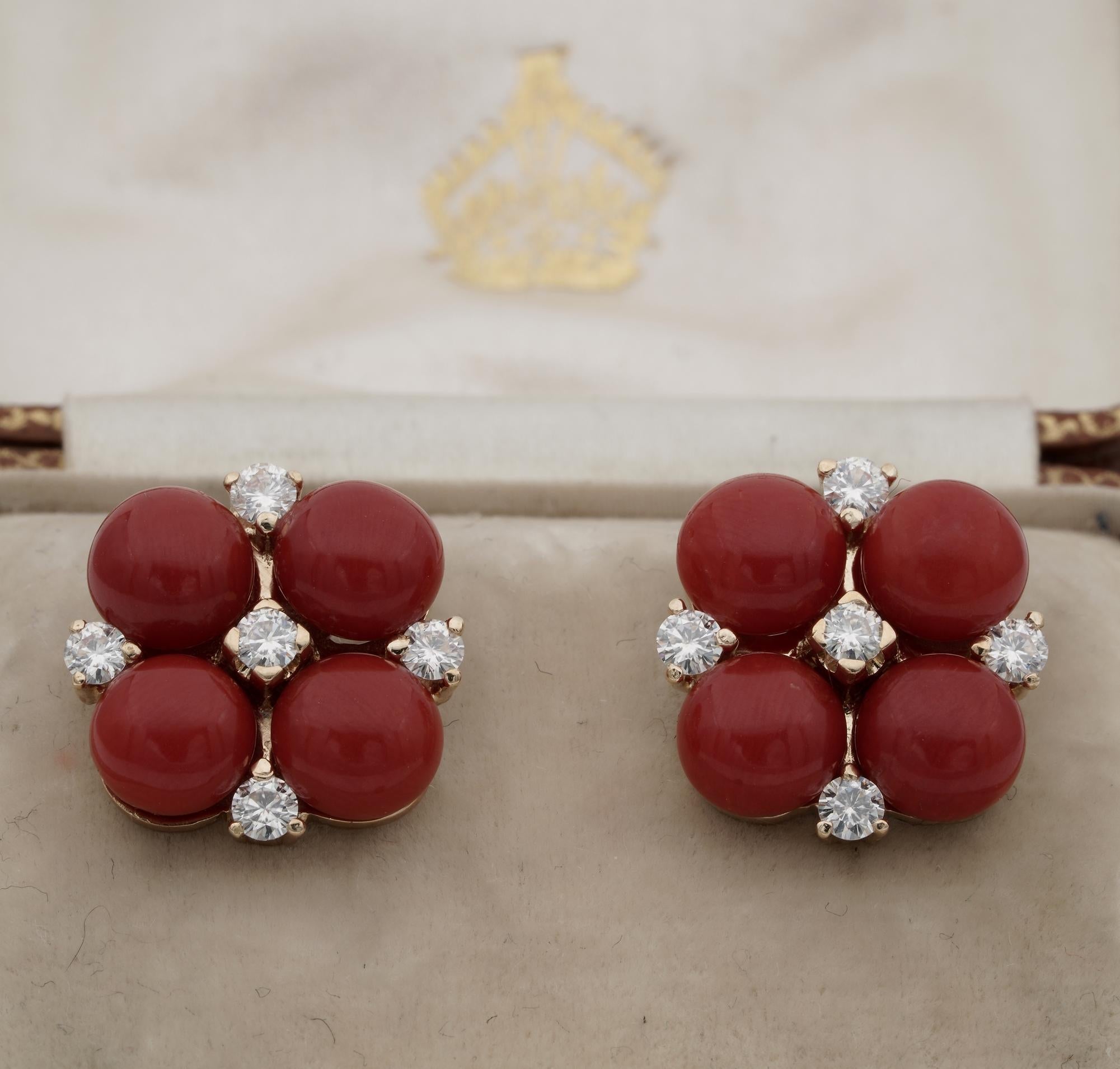Coral Appeal

Charming pair of timeless taste Coral and Diamond earrings
Hand crafted of solid 18 KT gold in a lovely floret design of appealing taste and elegance
Set with a selection of intense Red Natural untreated Sardinia Coral comprising four
