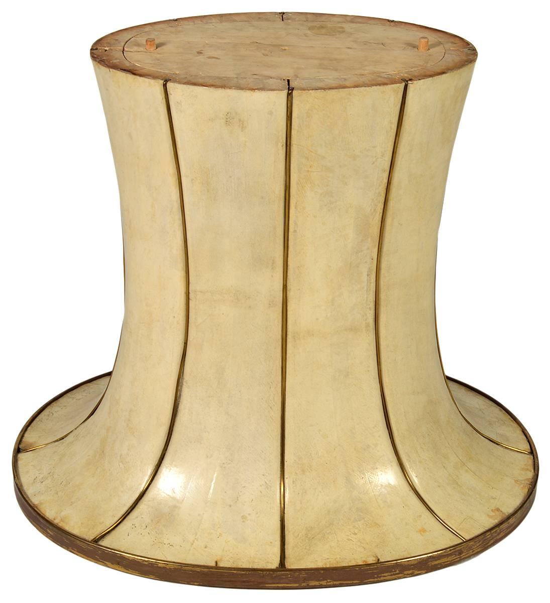 French parchment dining table. Pedestal base with brass adornments. Art Deco of the period. From a prominent collector. We have a glass top for it.