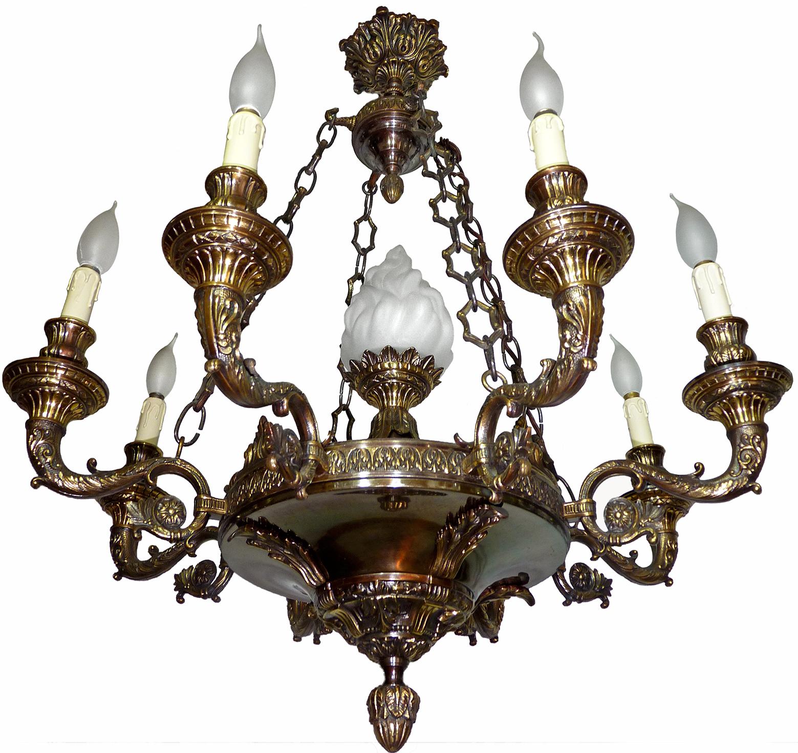 Spectacular large neoclassical French Empire chococate brown patinated and gilt bronze 9-light chandelier with faux candle sockets

Measures:
Diameter 27.6 in/ 70 cm
Height 35.5 in/ 90 cm
Weight 36 lb. (16 kg).
Glass shades, 11, 8 in (20 cm)/ 4.7 in