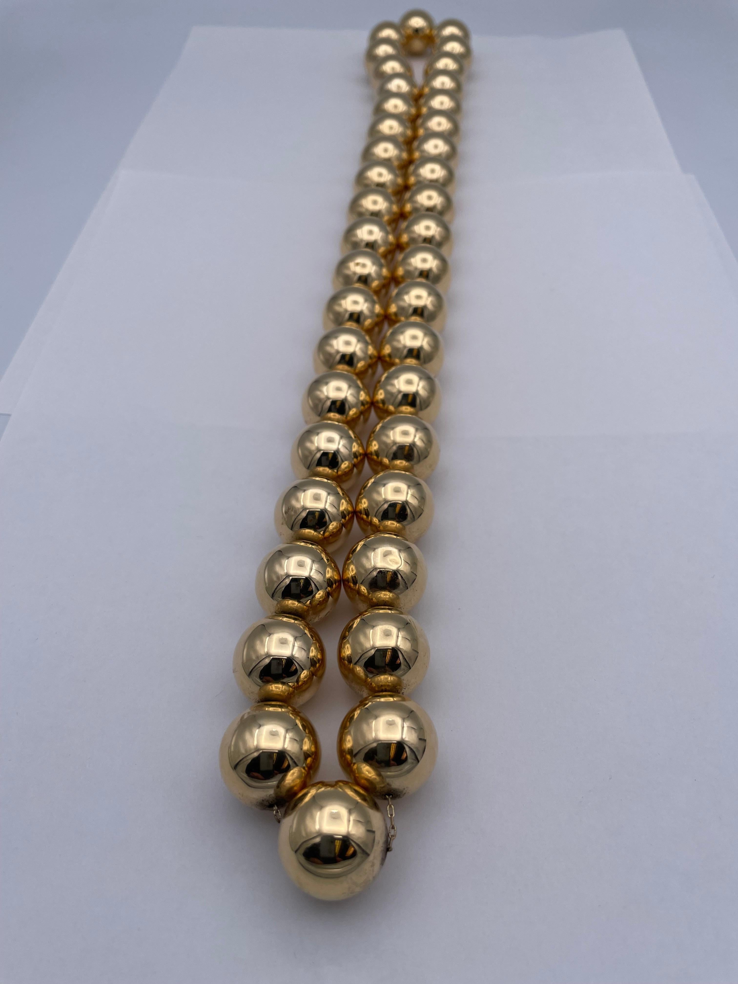 Fabuleux collier boule d'or en vente 1