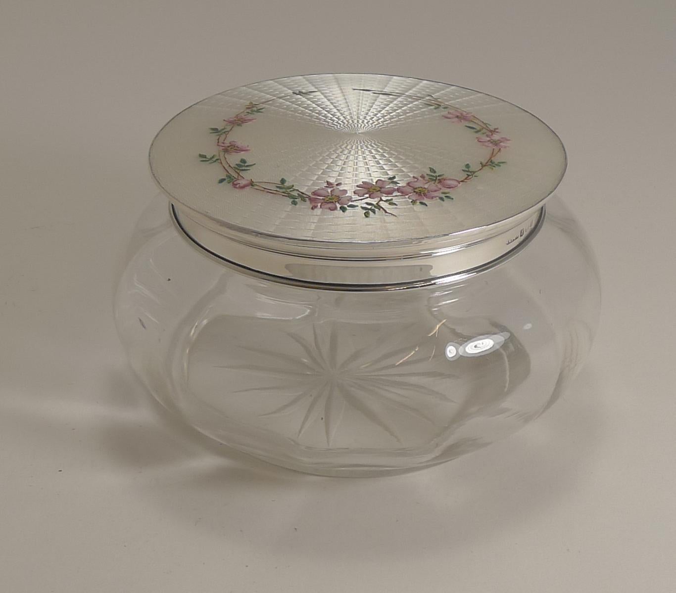 A magnificent and very large powder bowl or box, a really showy example with the most exquisite guilloche enamel lid.

The lid is made from English sterling silver with a hallmark (rubbed) for Birmingham 1924, making this nearly 100 years old. The