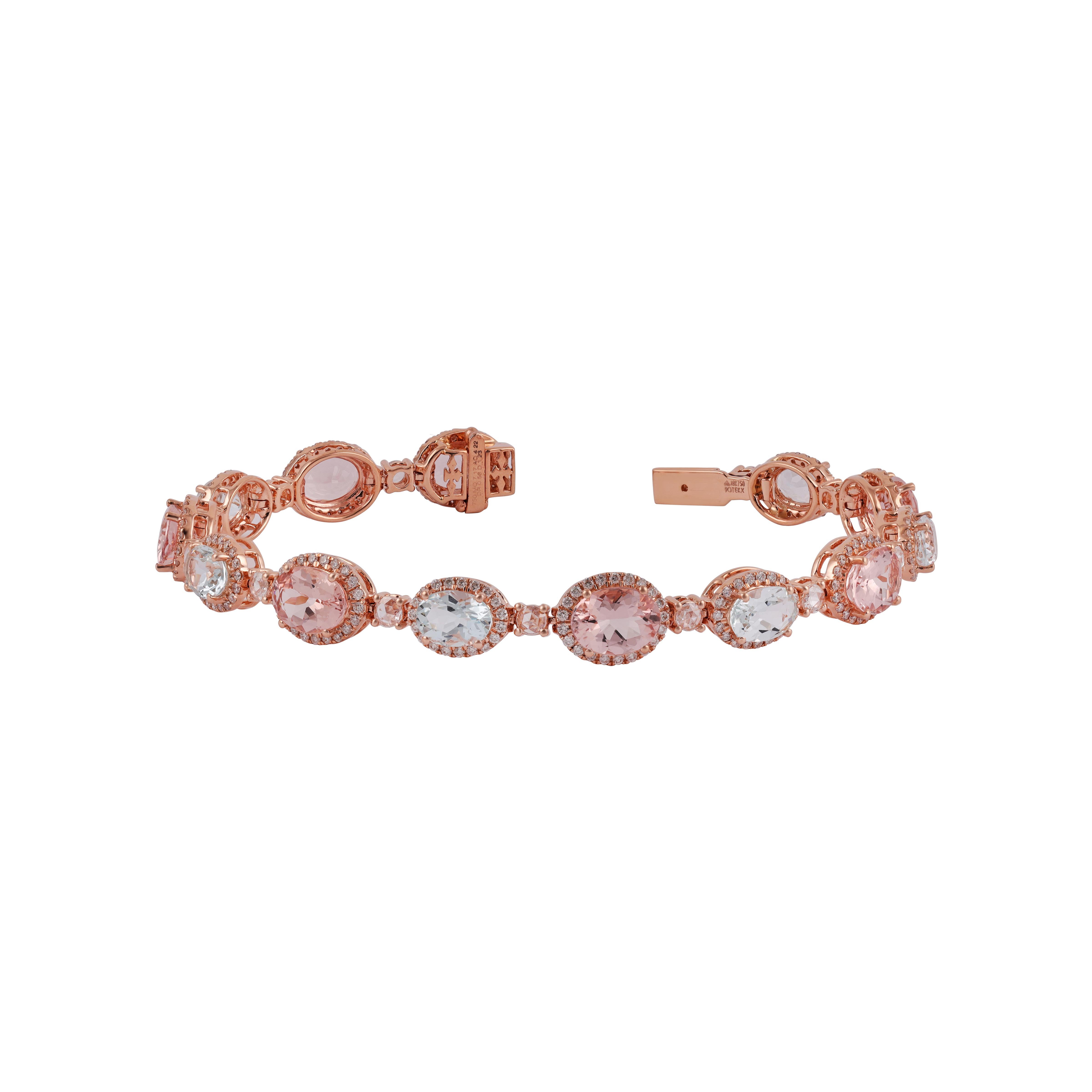 This timelessly elegant bracelet by Gem Plaza . Stern features 13 oval shaped aquamarines & Morganite of high clarity and vibrant luster. Their total weight is approximately 11.39 carats. Each aquamarine & Morganite is accented by rose cut Diamond &