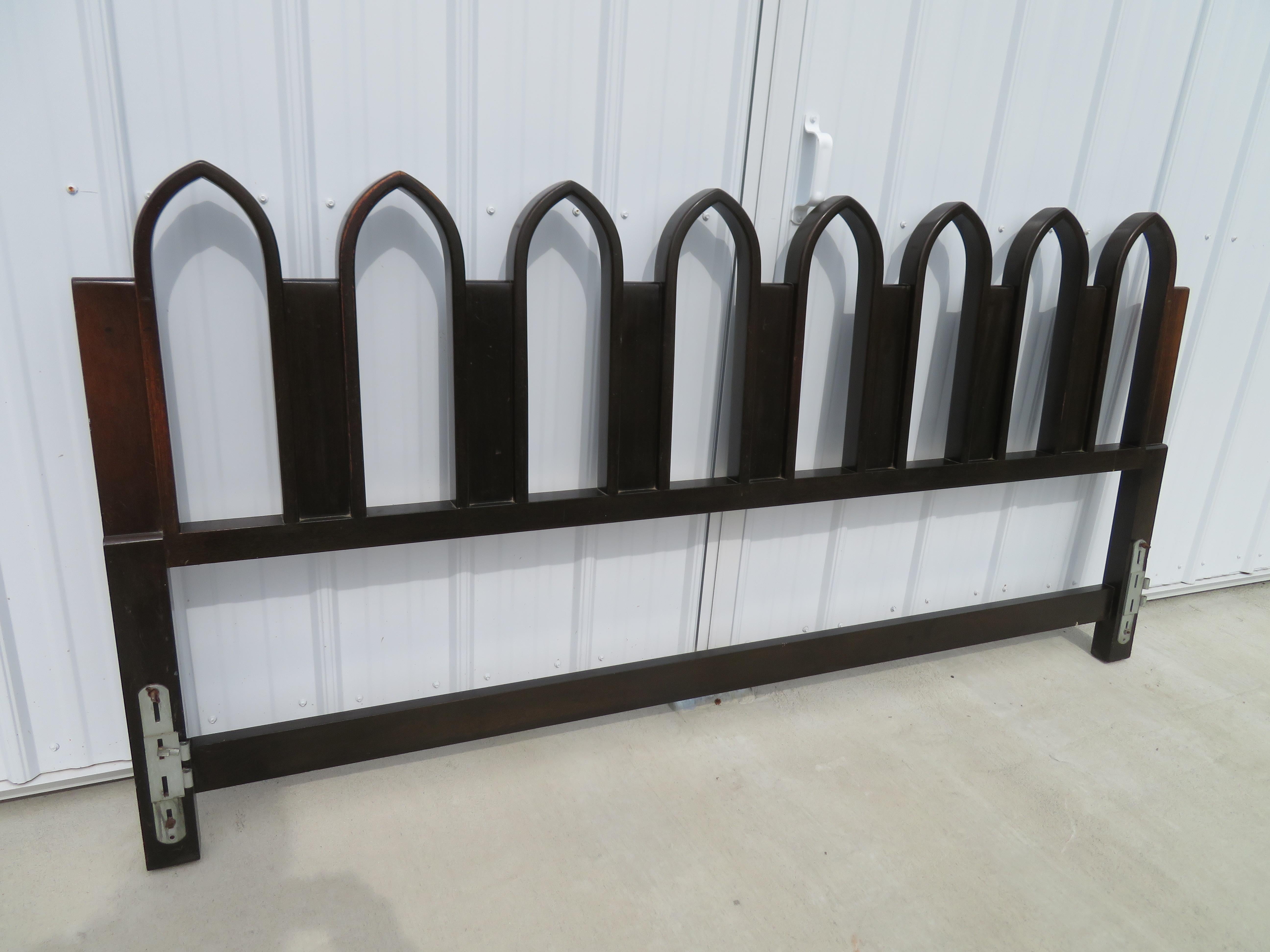 Ebonized walnut arches separated by natural walnut panels form a rhythmic design for this headboard. Identically finished on the reverse side so may free-stand if desired.