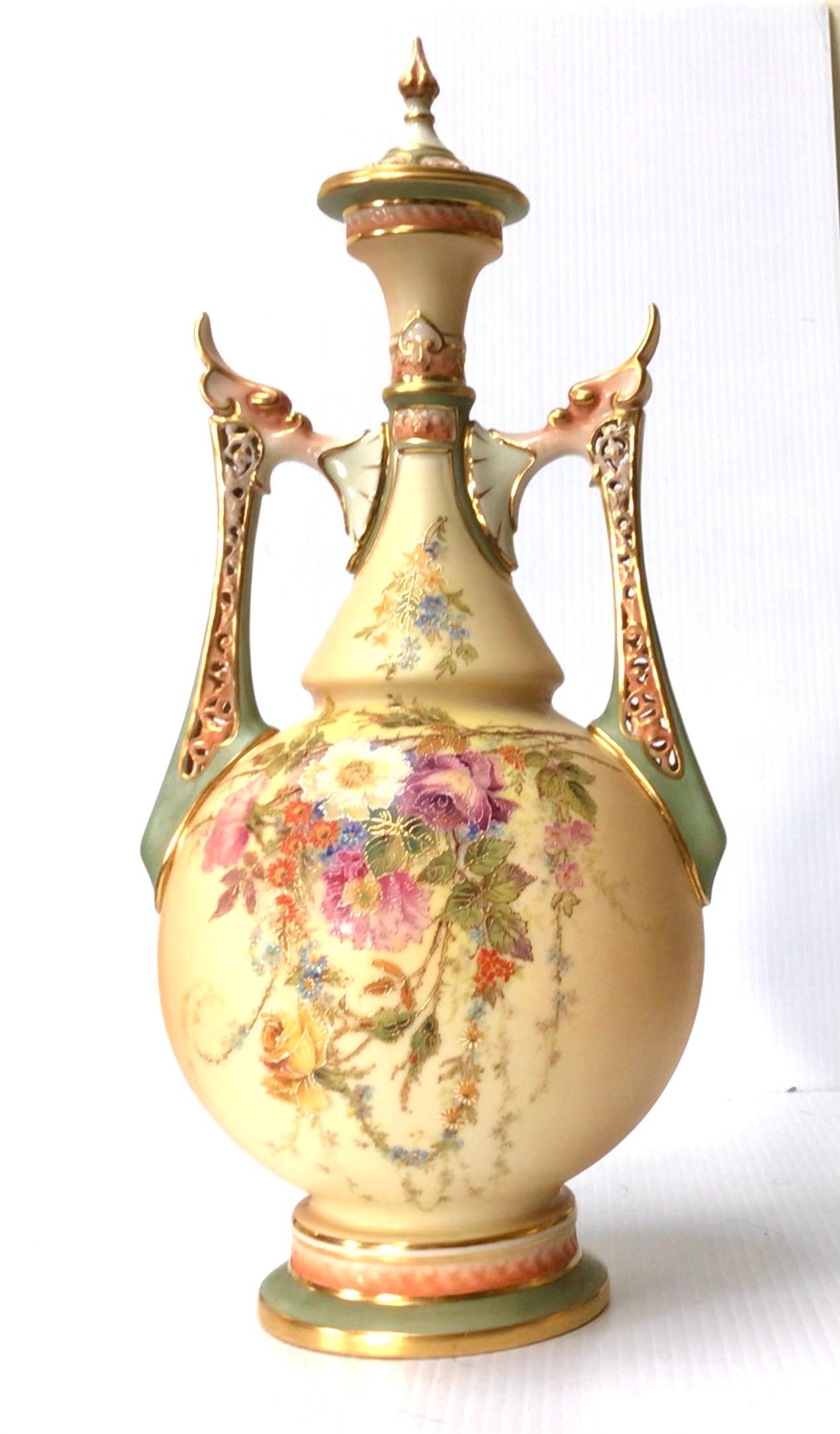 Fabulous large antique Royal Worcester blush ivory vase with cover hand painted with flowers and foliage. (Persian shape Influence)
Dated puce mark 1905
16ins x 7ins x 6ins deep.