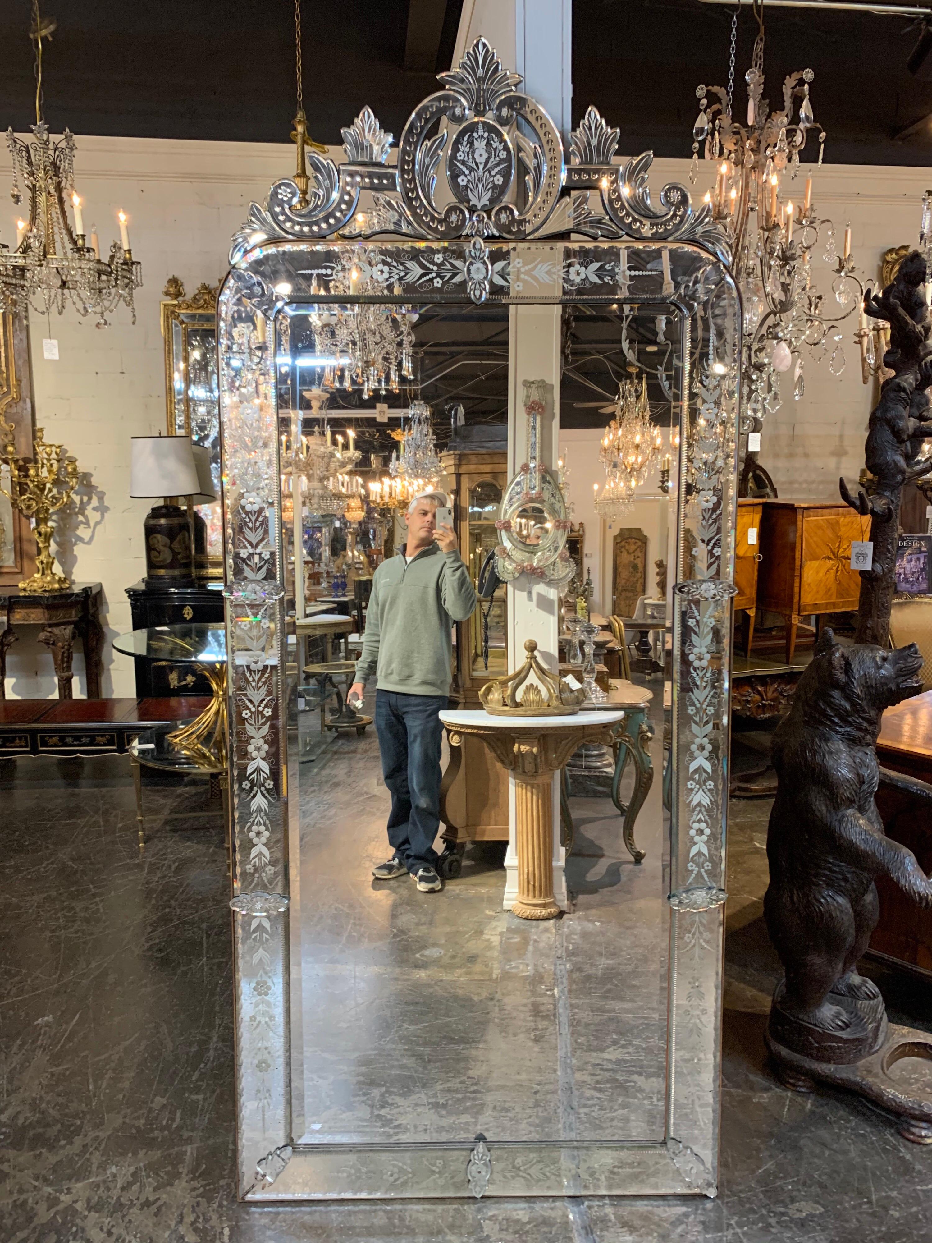 Very fine quality large scale antique Italian mirror from Venice. The mirror has beautiful etched details and lovely crown at the top. Extremely elegant and impressive and hard to find large size. Perfect as a floor mirror with plenty of height! All