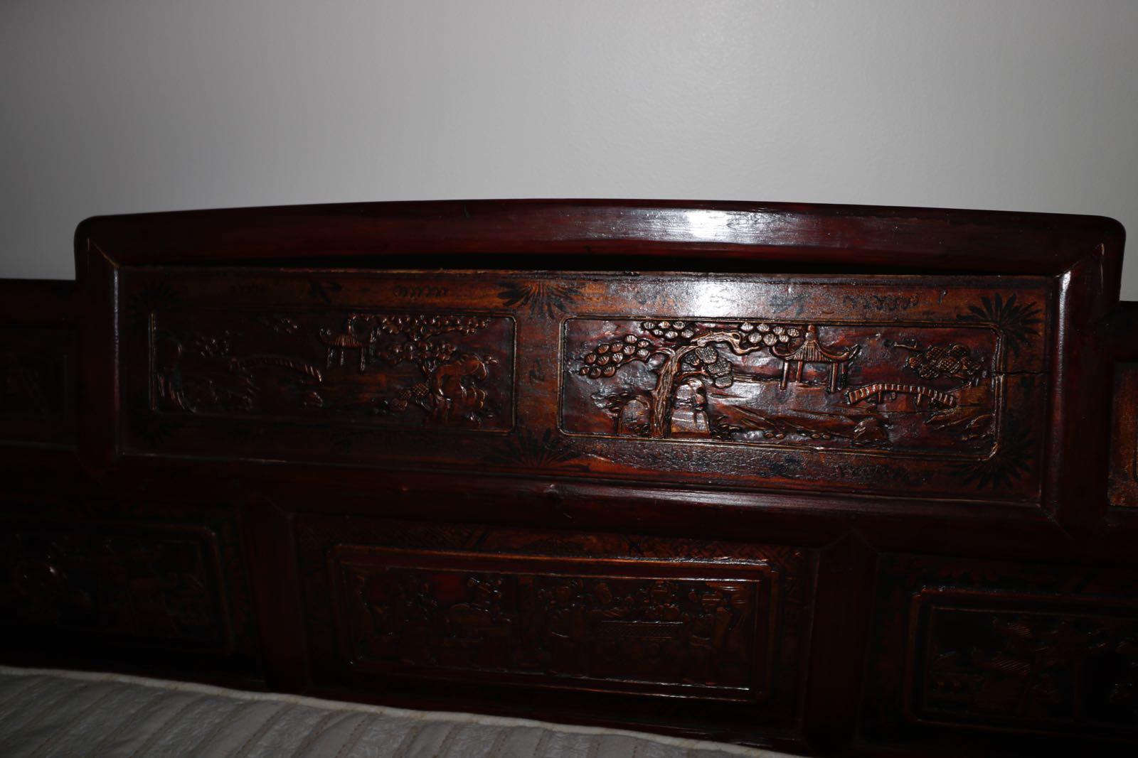 Fabulous late 19th century style hand carved and fabulous Chinese daybed. Cushion can use some TLC. Otherwise in fabulous condition. Great carvings! Solid mahogany.