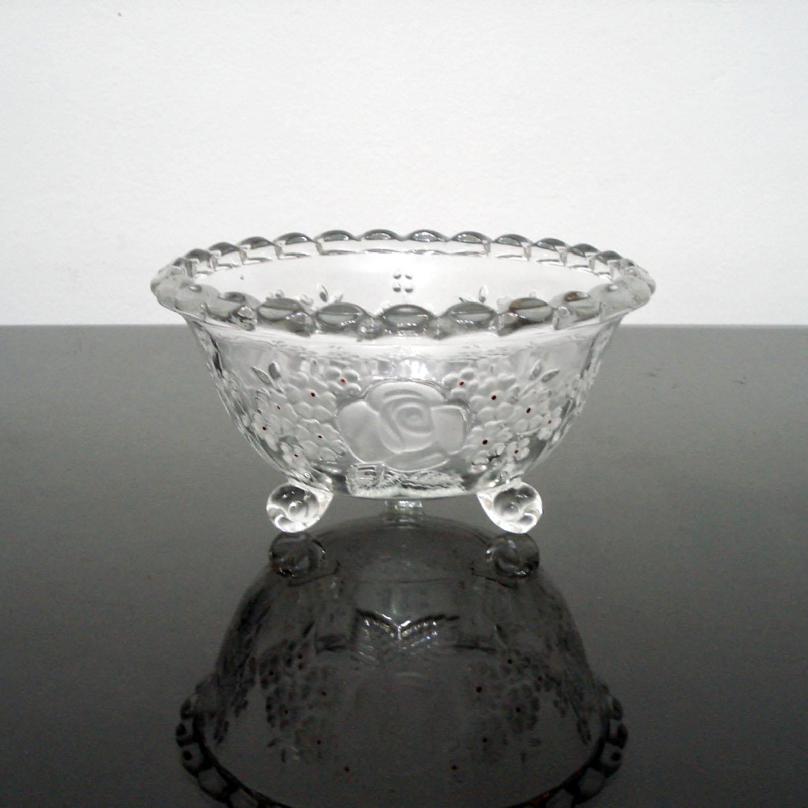 A gorgeous crystal glass bowl on 3 small feet. Richly decorated with etched roses and cherry flowers enhanced with red enamel. Twisted rim. Excellent condition.
Dimensions: Height 10 cm Diameter 18 cm.