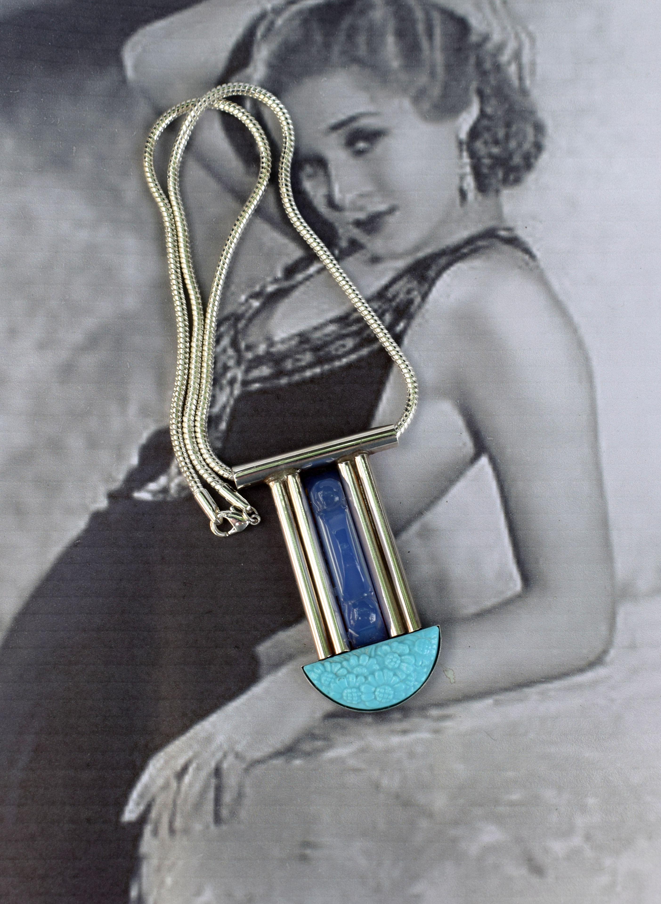 Fabulous French Modernist  Art Deco statement pendant necklace. This necklace is so so elegant and stylish, perfect for either a dressy evening or bohemian day wear. Features blue lapis carved centre accent with a blue Galalith 1930's vintage