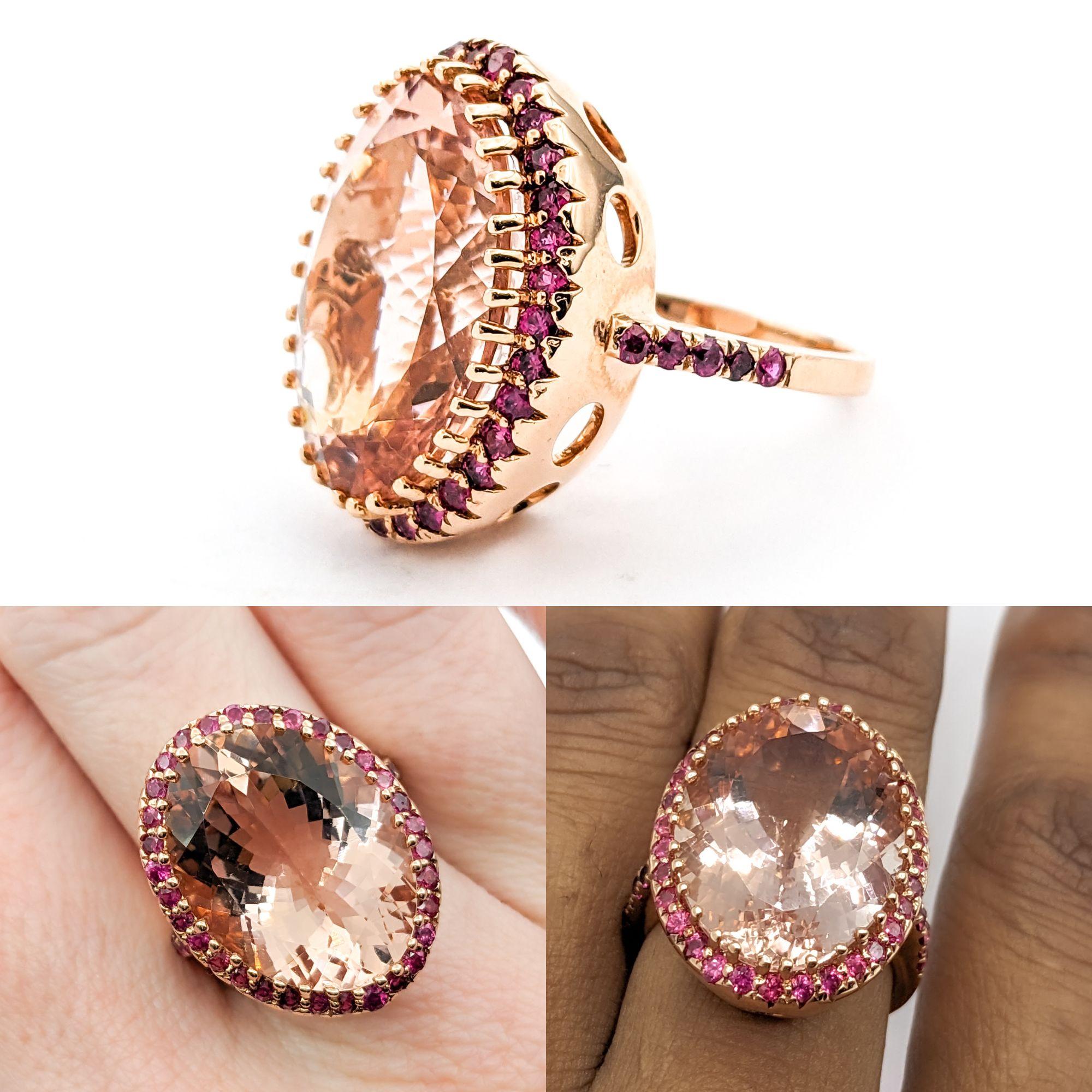 Fabulous Morganite & Ruby Cocktail Ring

This gorgeous statement ring is crafted in 14kt rose gold and features a 19 x 15mm oval-cut morganite surrounded by .50ctw round-cut rubies. This ring is size 7 but can be adjusted upon request (for a fee);