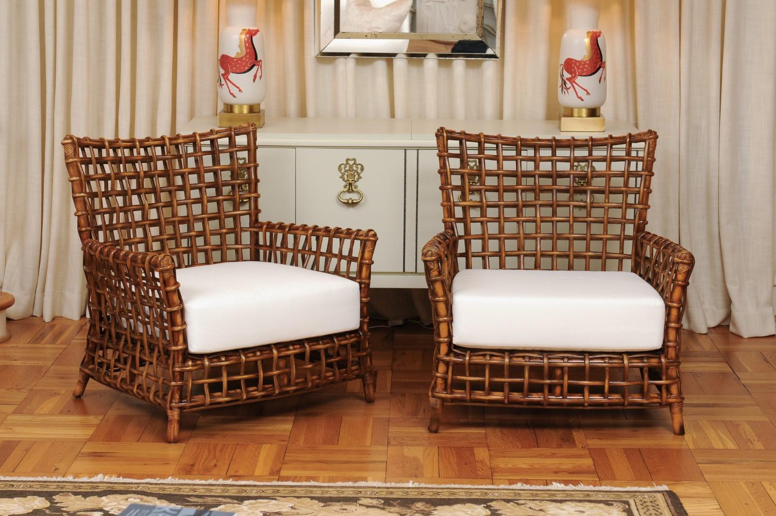 These magnificent club chairs are shipped as professionally photographed and described in the listing narrative: Meticulously professionally restored and installation ready. Expert custom upholstery service is available. Two (2) pair available.

A