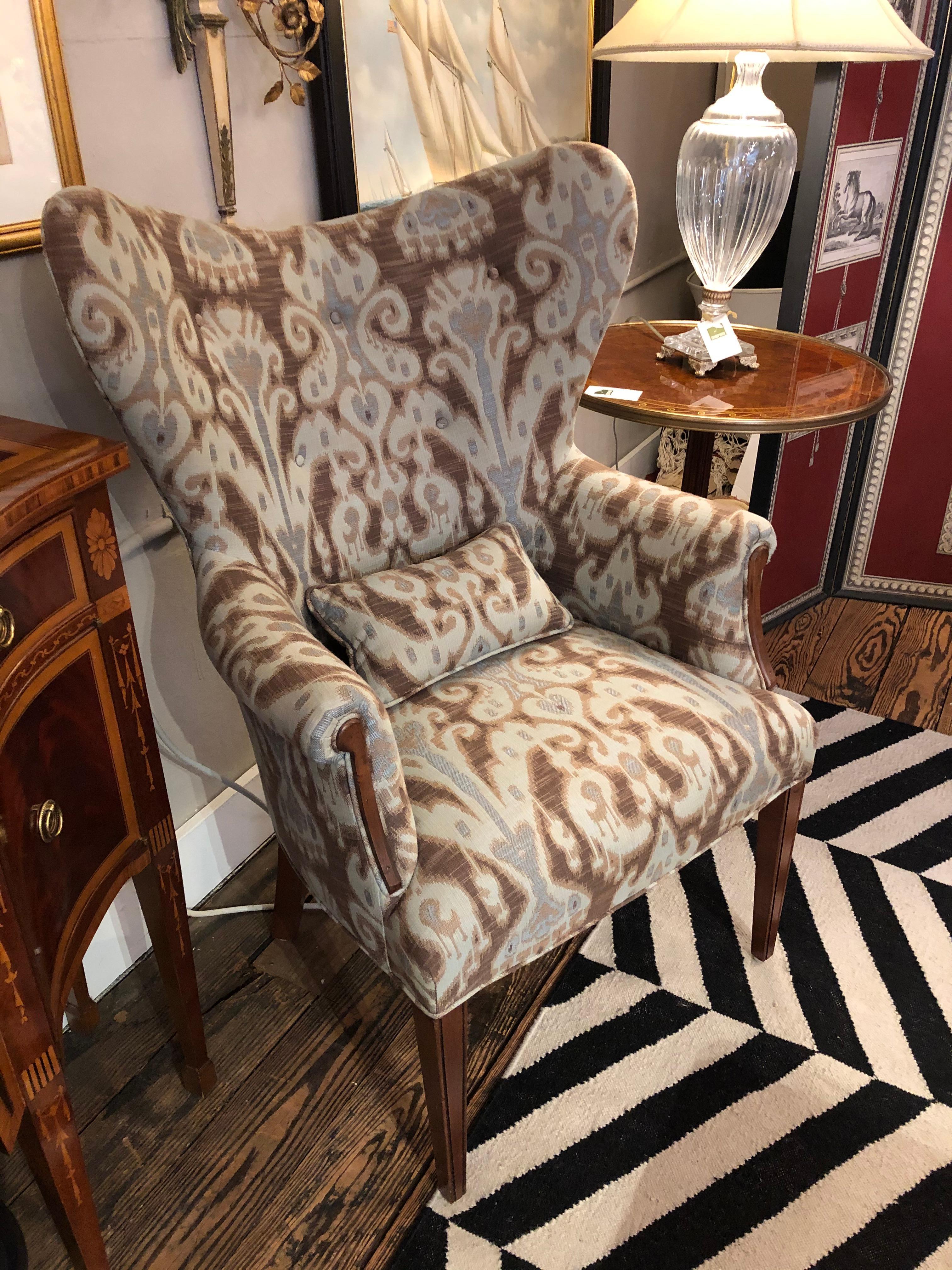 Show stopper style is found in this pair of contemporary wing chairs upholstered in Ikat fabric having soft shades of light blue and brown.
Label underneath says BZ
Measures: 31 W at top
28.5 W at arm
arm height 26.5.