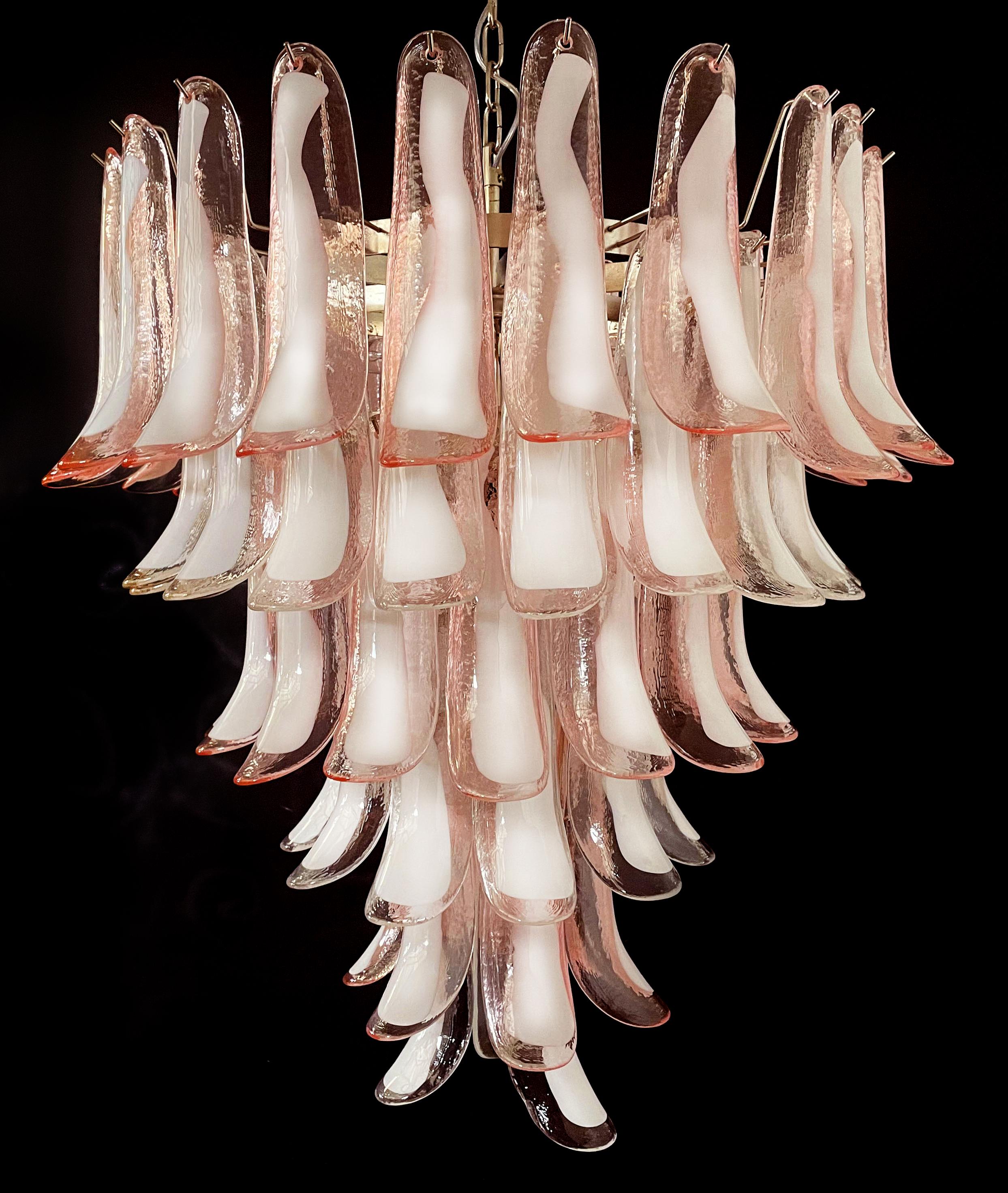 Pair of huge Italian vintage Murano chandeliers made by 75 glass petals (pink and white “lattimo”) in a chrome frame.
Period: late 20th century
Dimensions: 65 inches (165 cm) height with chain; 37.40 inches (95 cm) height without chain; 31.50 inches