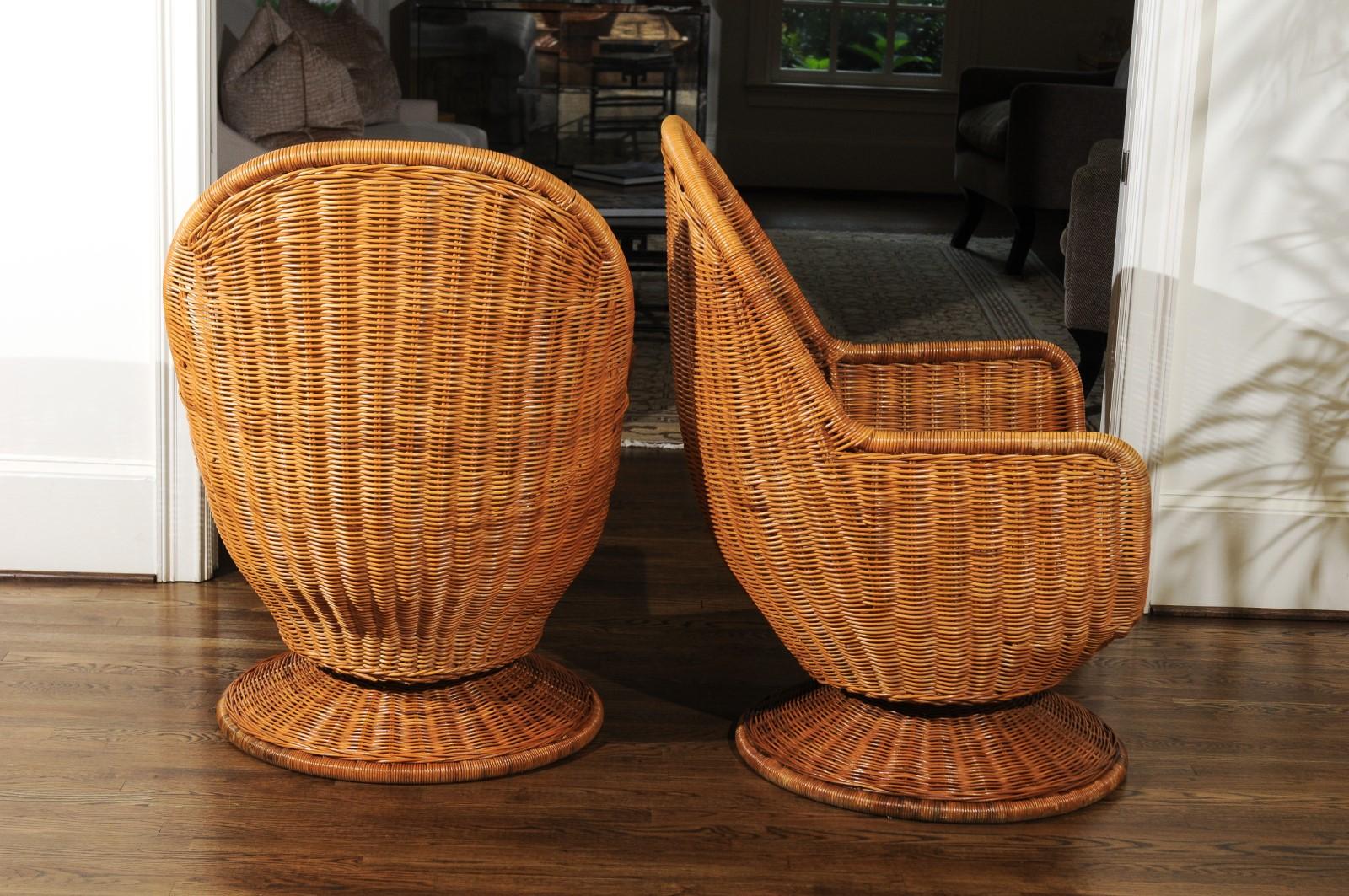 Fabulous Pair of Wicker Egg Swivel Club Chairs, circa 1975 1