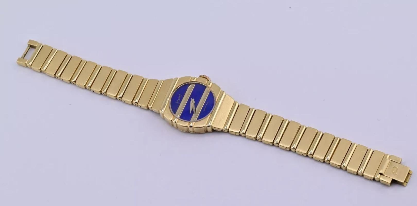 This fabulous Piaget wristwatch is a stunning piece that will surely catch anyone's attention. With a round shape and a polished finish, this watch is made of 18K solid yellow gold and features a beautiful Lapis dial color. The watch is powered by a